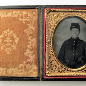 A sixth plate tintype titled "Young Soldier with Two Pistols" shows a man in a Civil War-era uniform, housed in an ornate open photo case with decorative velvet lining on the left.