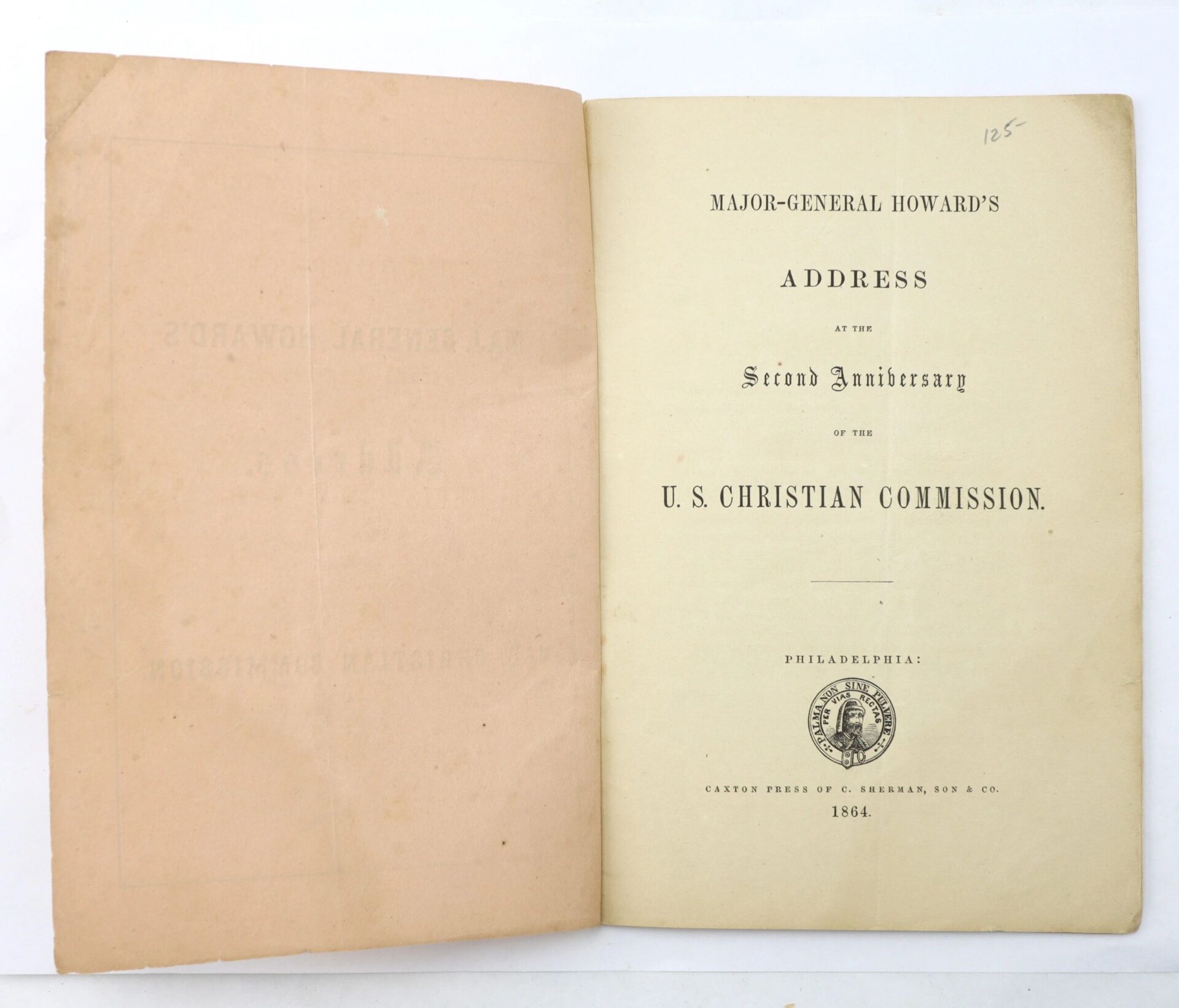 Open book displaying the title page of “U.S. Christian Commission,” published in Philadelphia, 1864.
