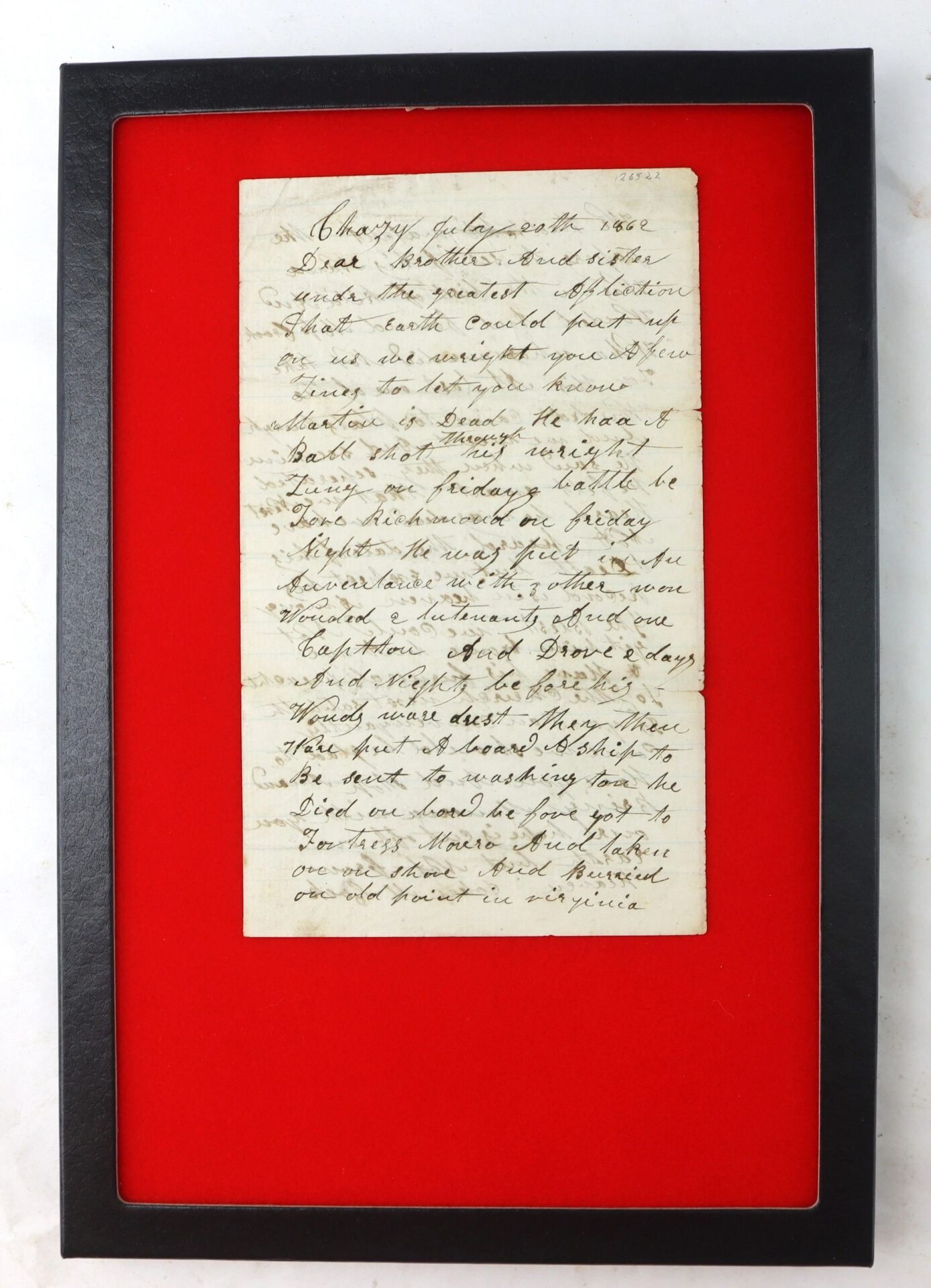 The Last Full Measure Death of a Soldier Letter is an aged handwritten letter in cursive, displayed in a black frame with a red background.