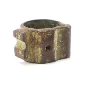 The Boyle, Gamble, & McFee Bayonet Adapter is a cylindrical metal ring with a hexagonal outer shape, featuring a notched cutout and a small hole on one side.