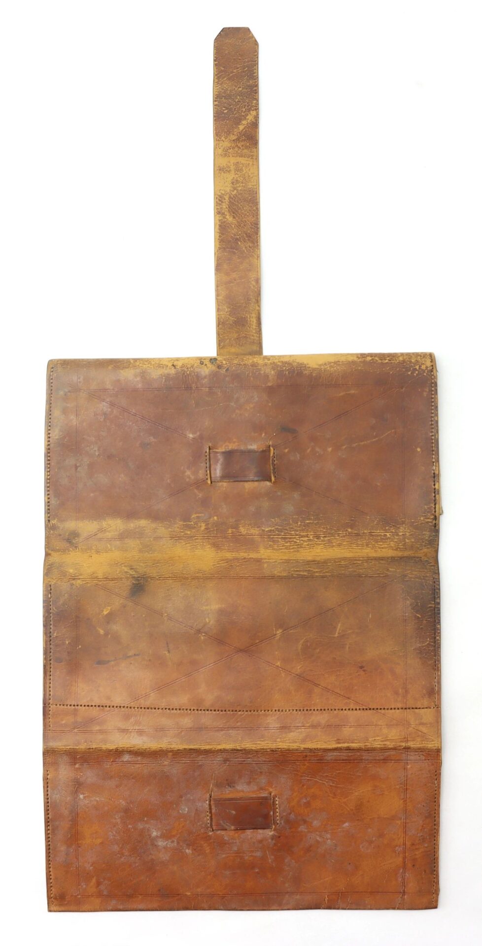 The Inscribed Wallet of Corporal David Steele, 2nd New Hampshire Infantry, is a rectangular brown leather document holder with a flap and strap, shown open to display its interior compartments against a white background.