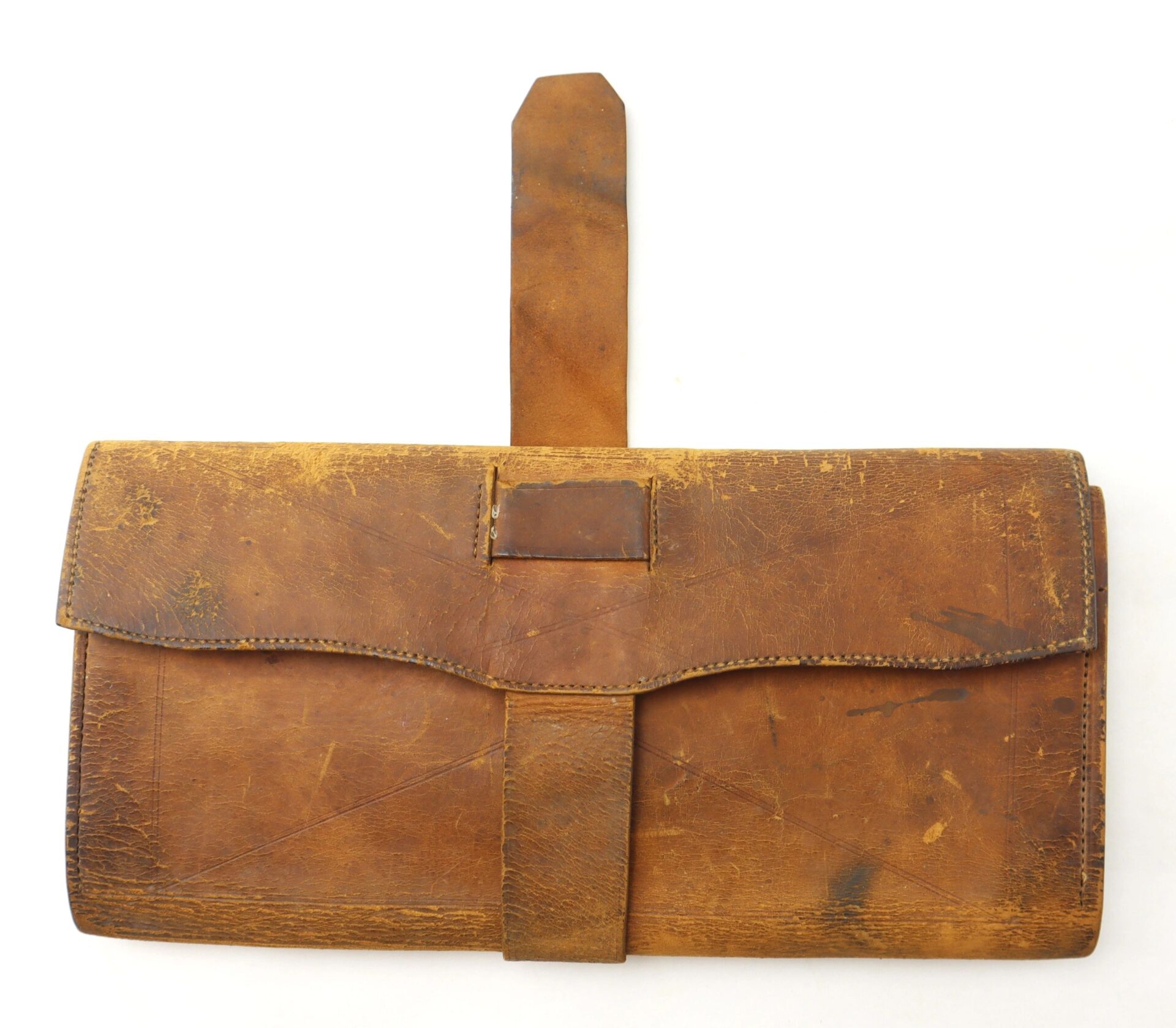 The Inscribed Wallet of Corporal David Steele, 2nd New Hampshire Infantry, is a brown leather wallet with a flap closure, showing visible creases and scuffs.