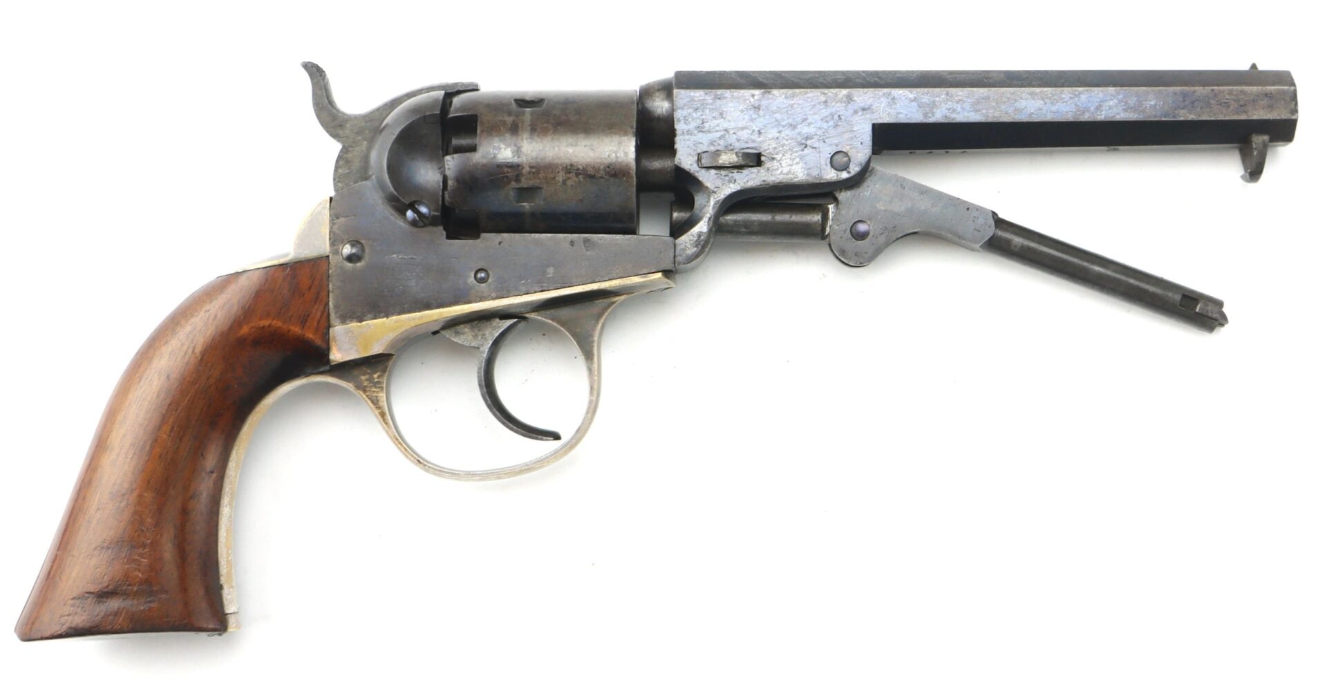 The Cooper Double Action Revolver, featuring a wooden grip and metal frame with an exposed hammer, is displayed in side view against a white background.