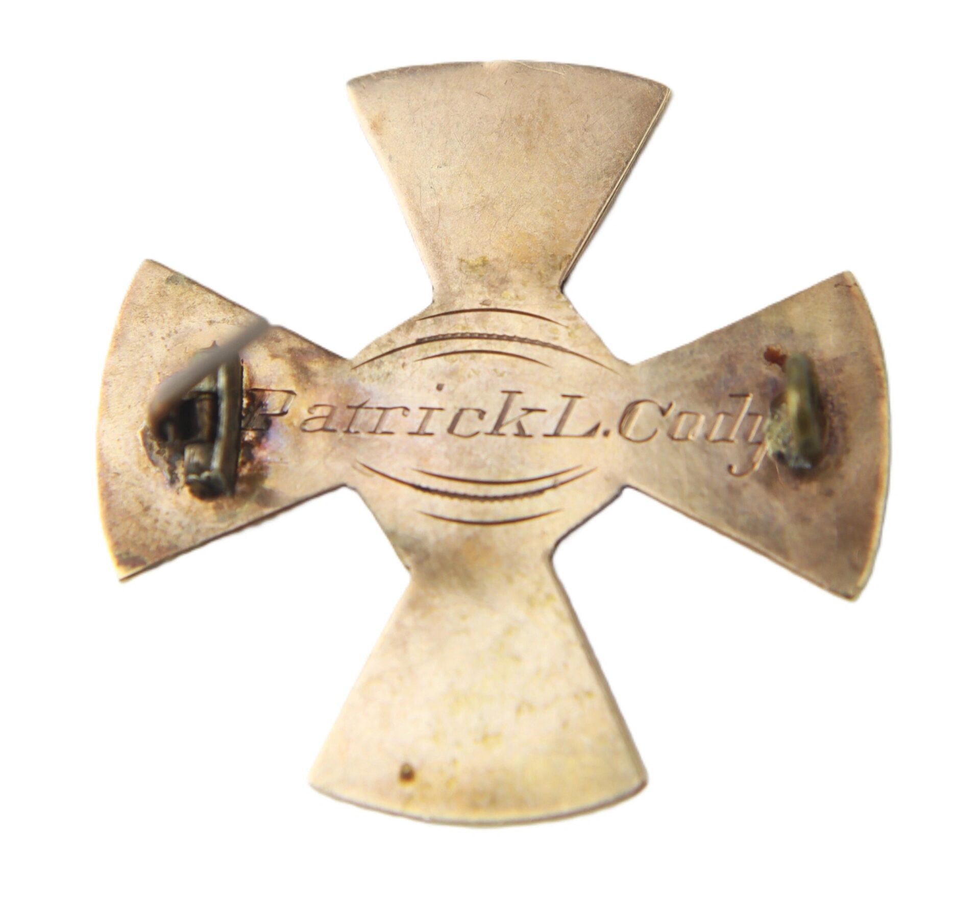 A gold identification badge from the Civil War for Pvt. Patrick L. Cody, Company A, 128th NY Volunteer Infantry, 19th Army Corps, Union Army (1862–1865), engraved with his name on the back.