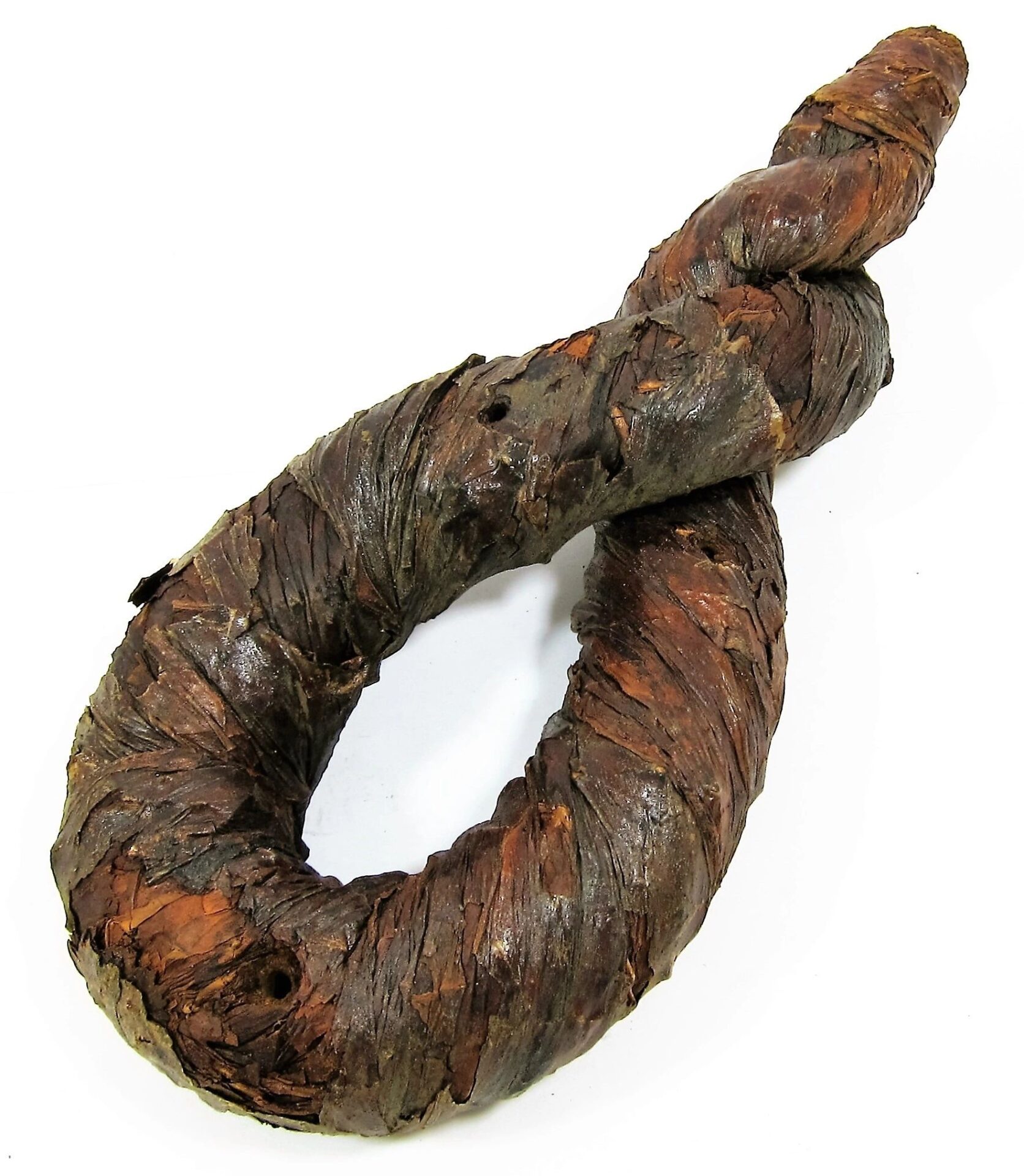 A large, twisted, dark brown Tobacco Twist resembling a coiled rope is displayed against a white background.