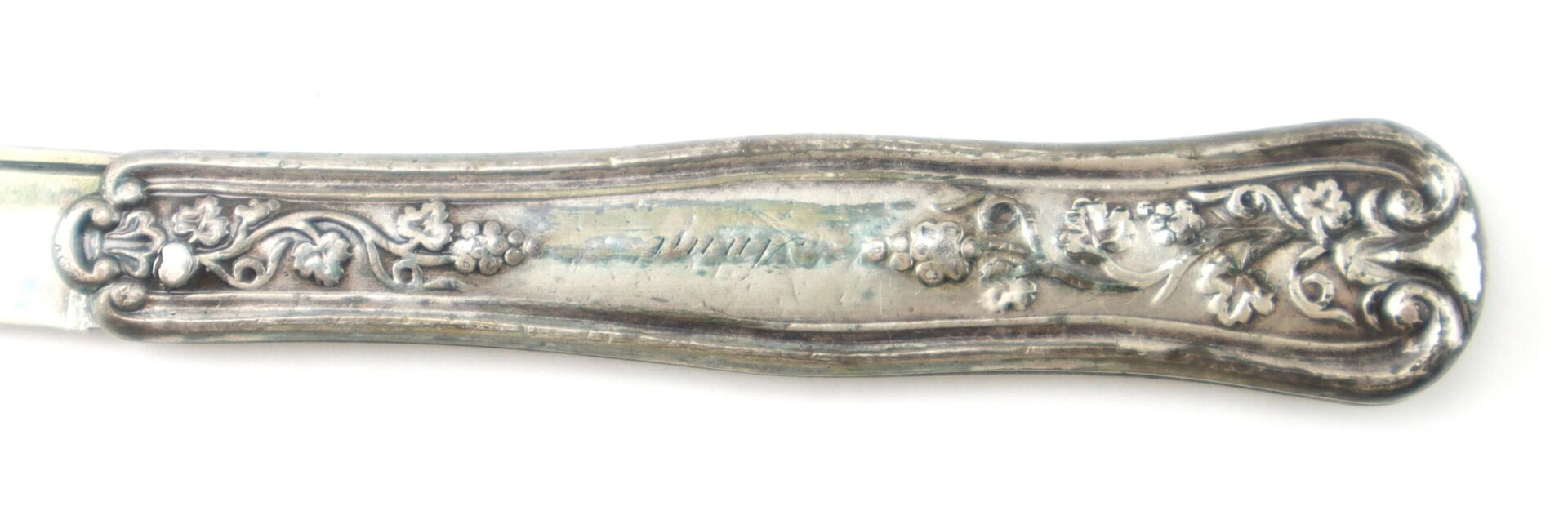 British Sterling Silver Folding Fruit Knife featuring a floral repoussé handle, set against a white background.