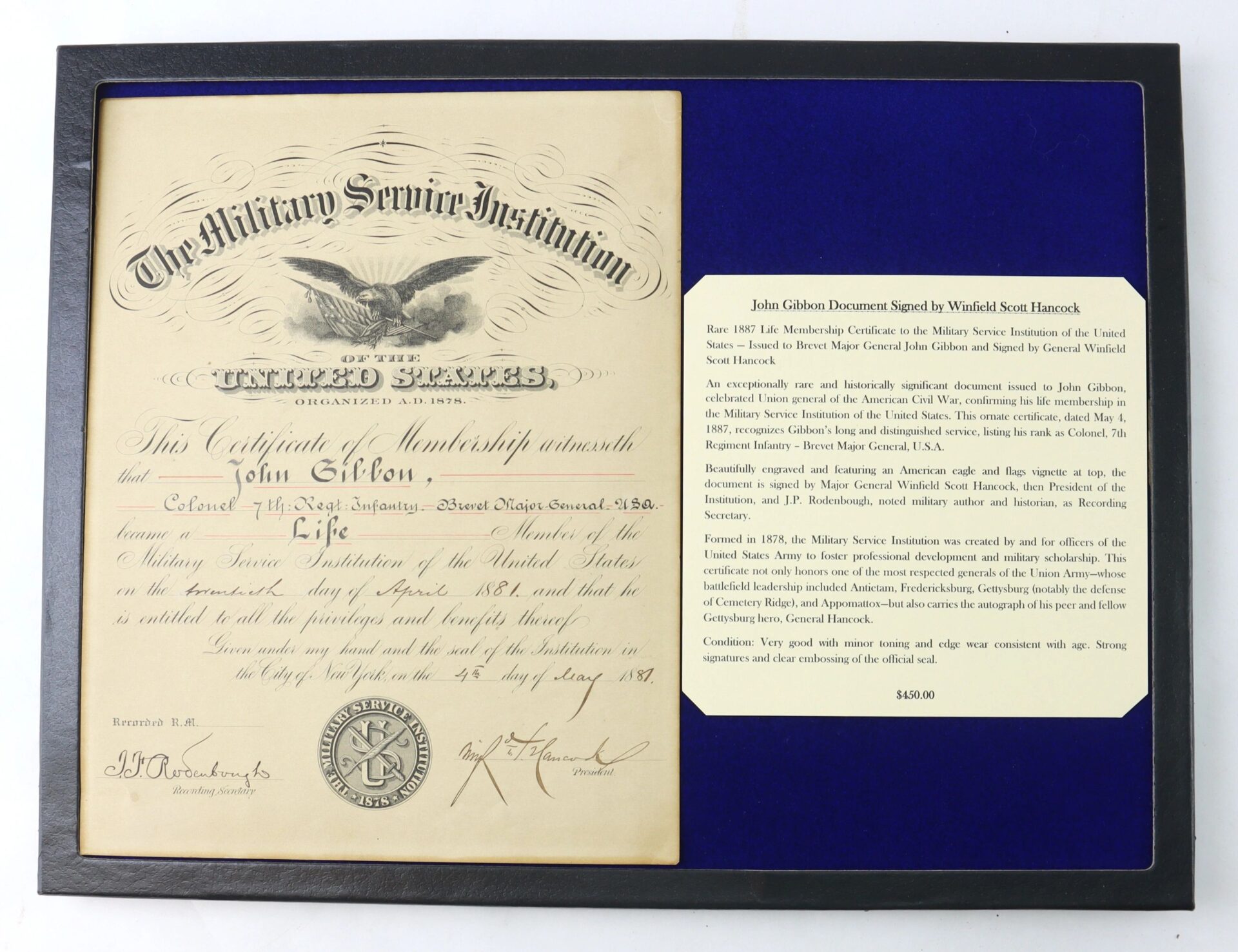 A framed John Gibbon document, signed by Winfield Scott Hancock, with an eagle crest left and a signatories info placard right, both displayed on a blue background.