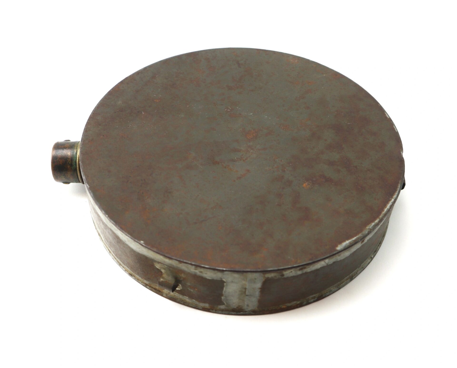 A Civil War Tin Drum Canteen, round and flat with a short spout, made of rusted metal, is shown on a white background.