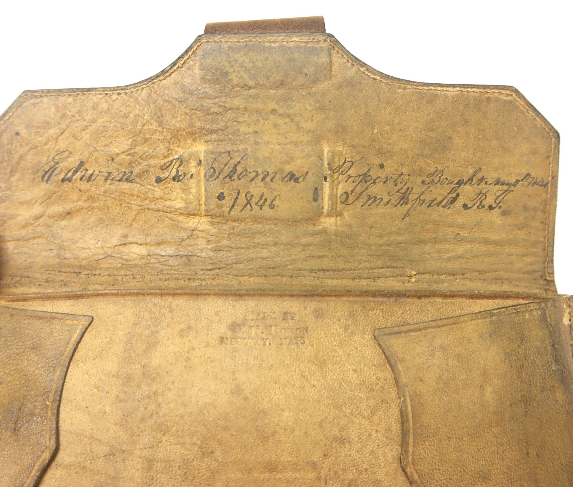 Leather Wallet (Dated 1846) featuring worn leather and an interior inscription in cursive with names, the year 1846, and locations like Providence and Smithfield, Rhode Island.