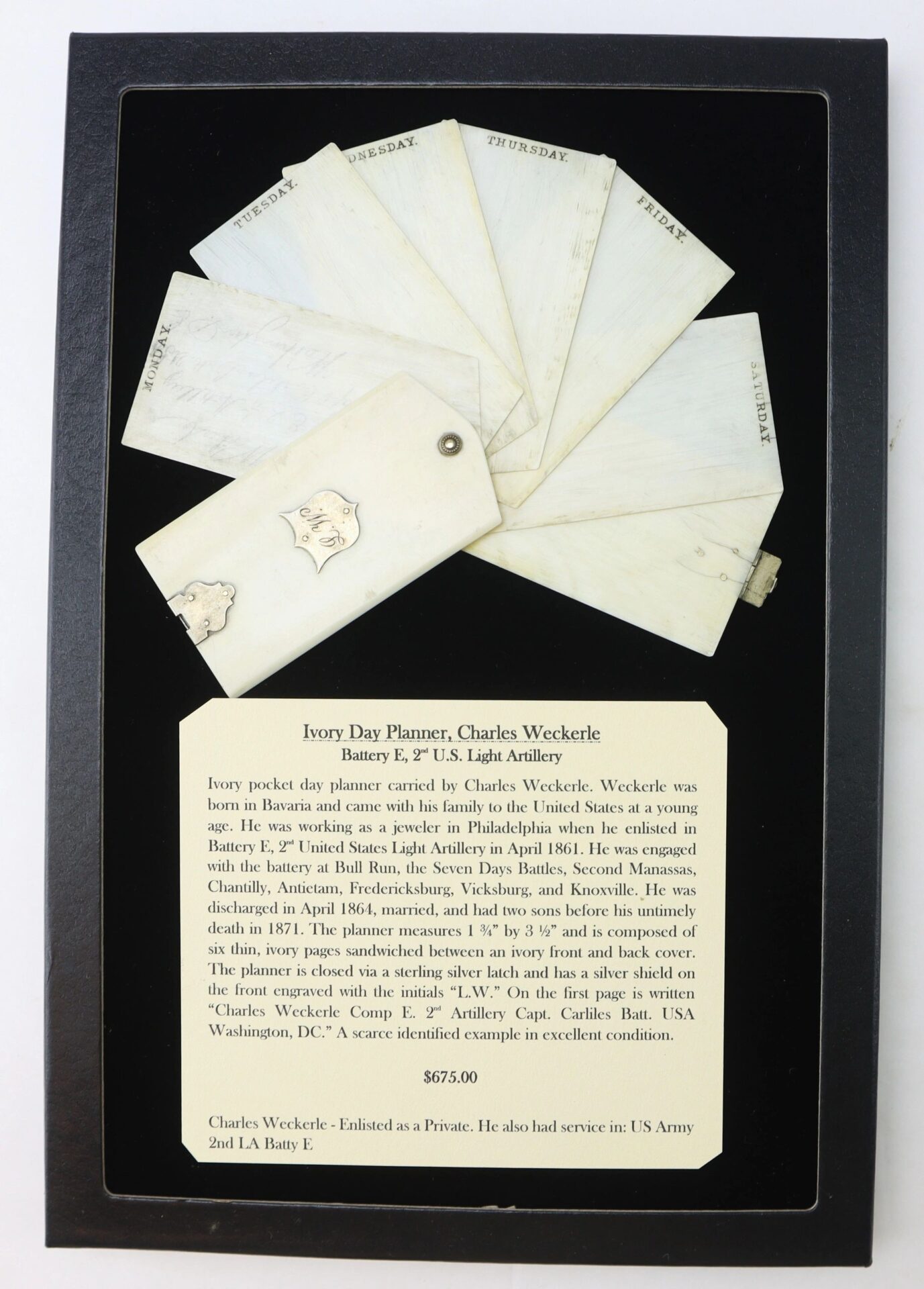 Ivory Day Planner from Charles Weckerle, Battery E, 2nd U.S. Light Artillery, features daily-labeled pages and comes with a card describing its history and value.