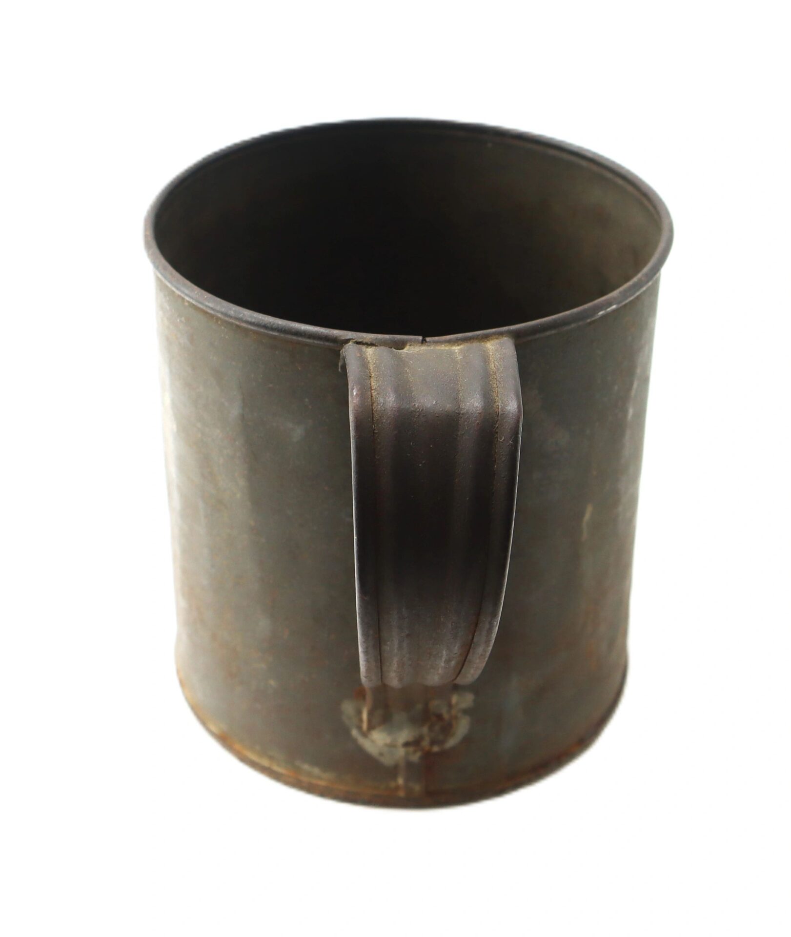 A Civil War Tin Cup, plain and cylindrical with a handle, displayed against a white background.