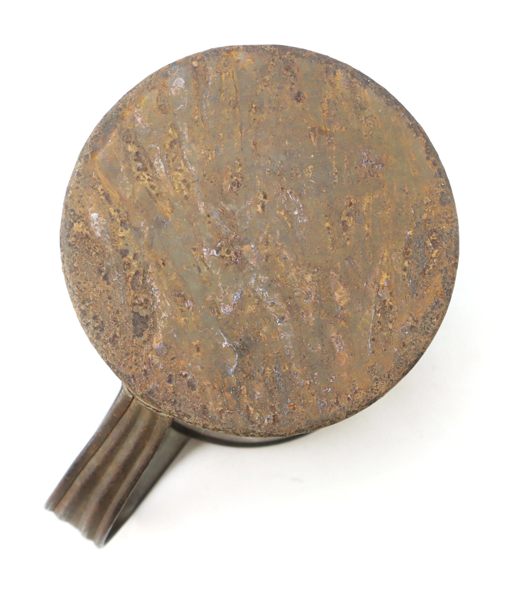 A Civil War Tin Cup, round and rusted with a flat top and short side handle, is shown from above against a white background.