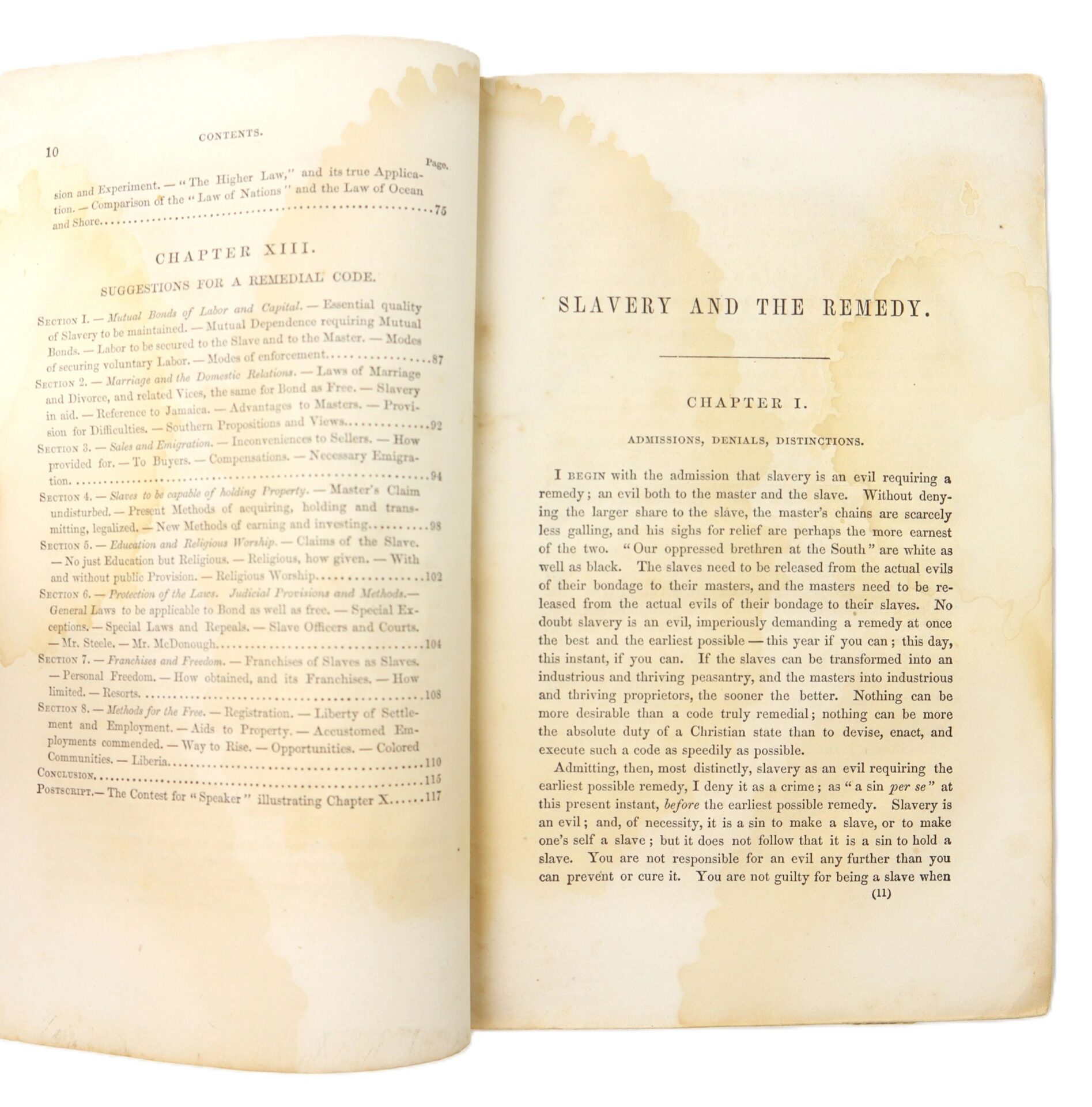 An open copy of “Slavery and the Remedy” (1862) by Samuel Nott, 4th edition, shows a stained contents page next to a chapter on slavery; includes an engraved slave trade print.