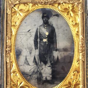 An Exceptional Sixth-Plate Tintype of an African American soldier from the 14th Rhode Island Heavy Artillery (Colored), displayed in an ornate gold floral frame—rare, identified, and historically significant.