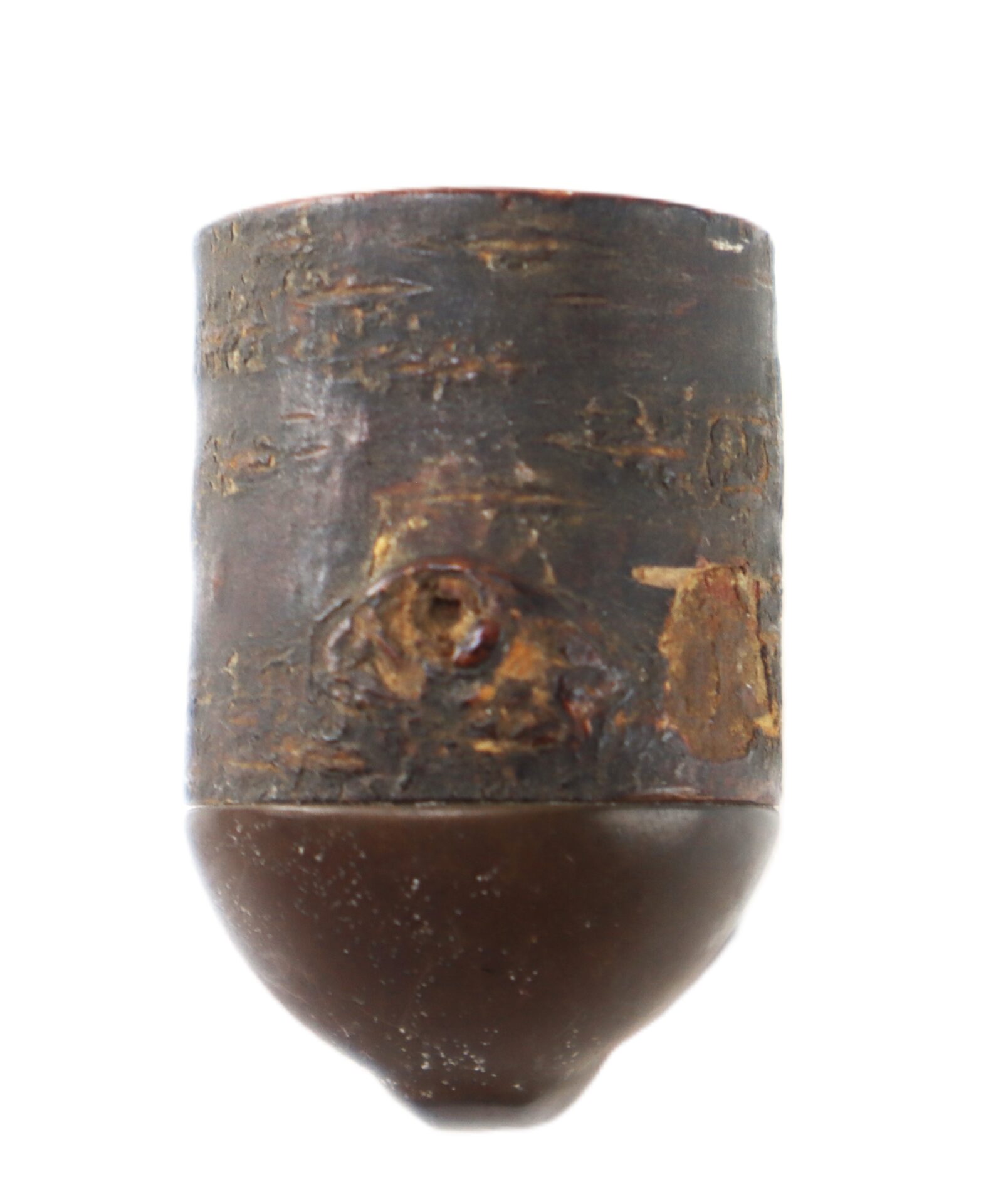 A close-up of a Civil War Era Gutta Percha and Wood Pipe Bowl, featuring its cylindrical shape and rounded bottom, isolated on a white background.