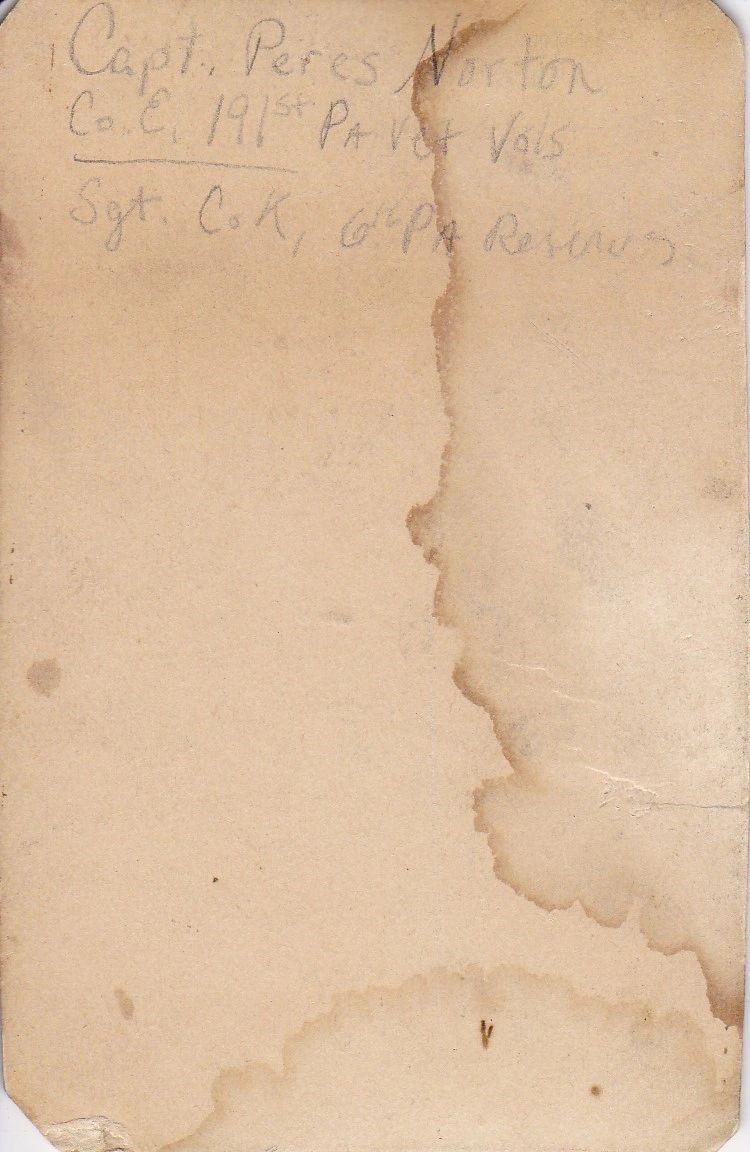 A historic paper with handwritten text referencing Perez L. Norton, 6th Regiment PRVC, is included with this item.