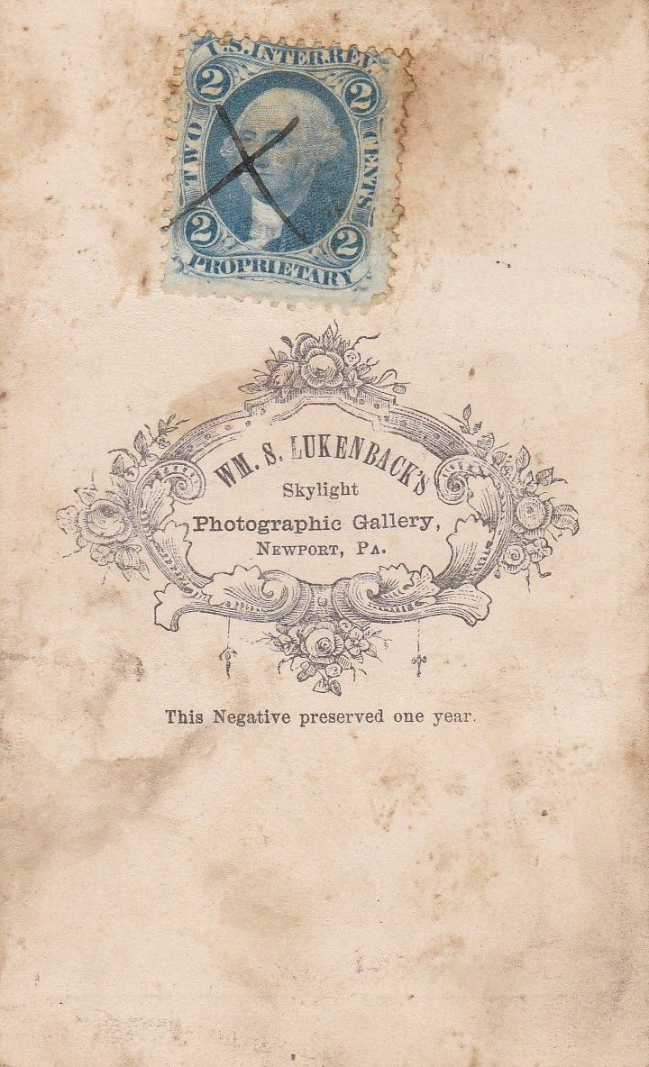 A vintage 2-cent U.S. stamp above an ornate label for Company "B" 7th Pennsylvania Volunteer Reserve Corps, with text stating negatives are preserved for one year.