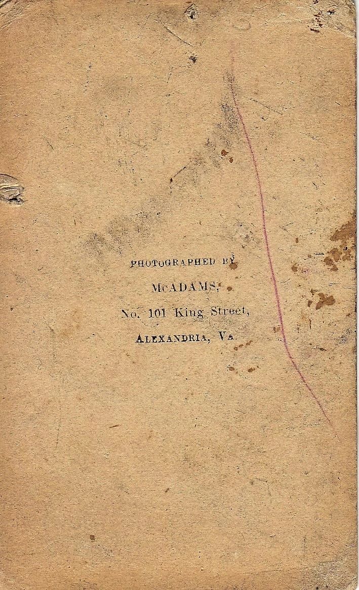 Aged paper with typed text: "PHOTOGRAPHED BY McADAMS, No. 101 King Street, ALEXANDRIA, VA." Features stains and a red line. Product: Company "B" 7th Pennsylvania Volunteer Reserve Corps / SOLD.