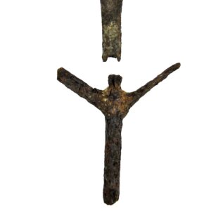 Three rusted, Y-shaped iron gun tools of the Confederacy are displayed separately against a white background, each shown from different angles to highlight their distinct features.