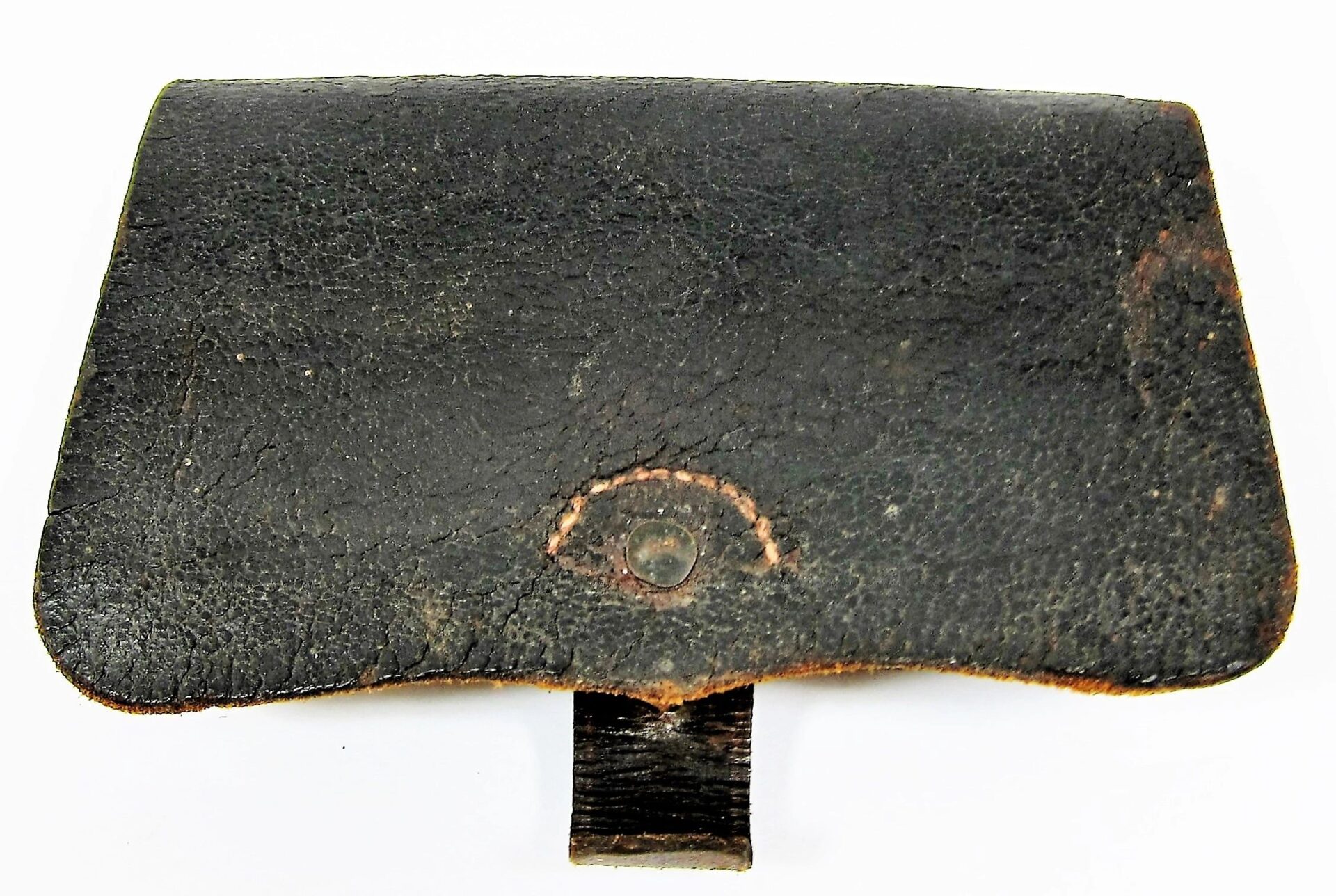 A worn Civil War Pistol Box featuring black leather, a flap cover, and metal snap closure, displaying visible signs of age and use.