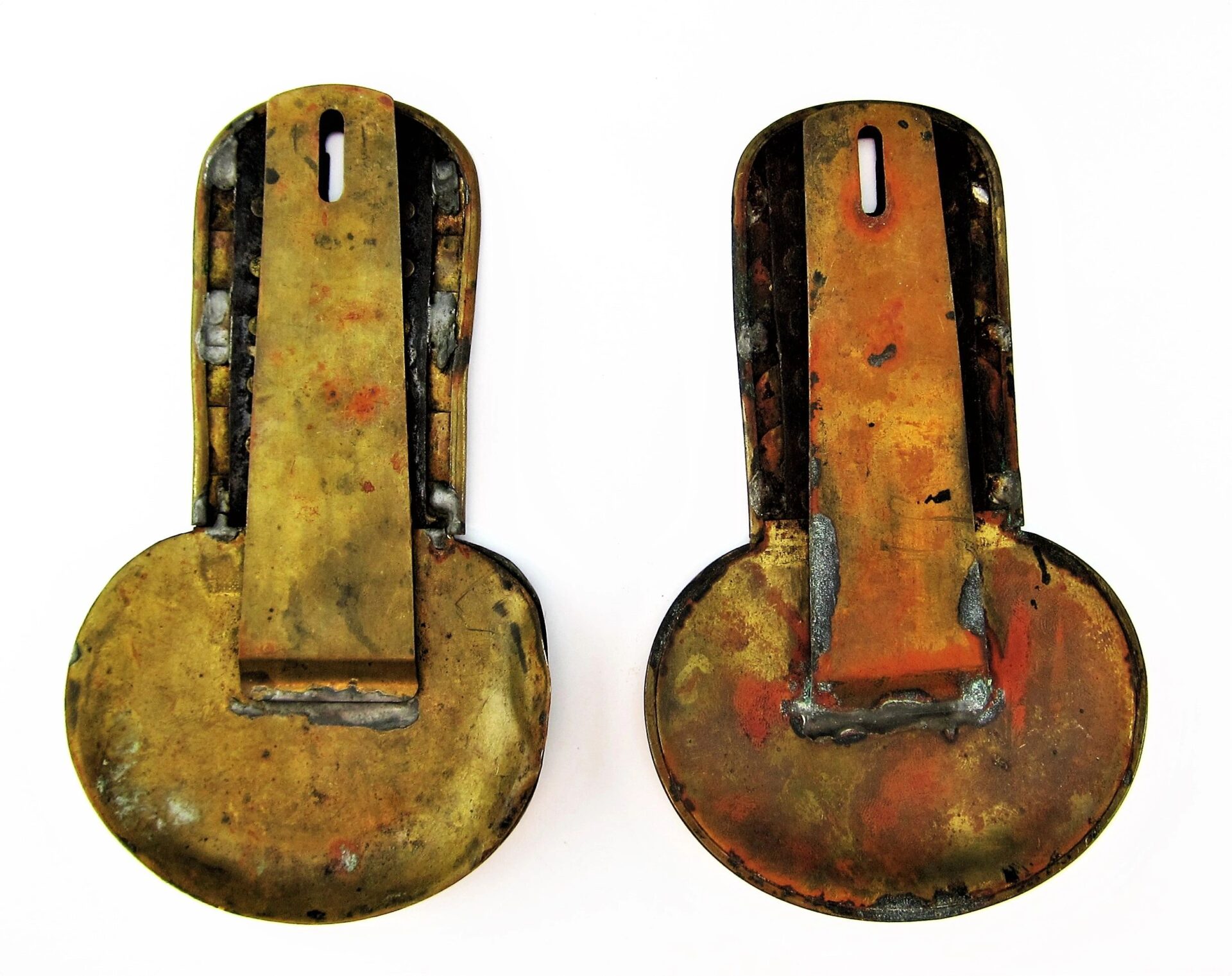Two identical Civil War Shoulder Scales with round bases and rectangular hinged flaps featuring slot openings at the top, are displayed side by side on a white background.