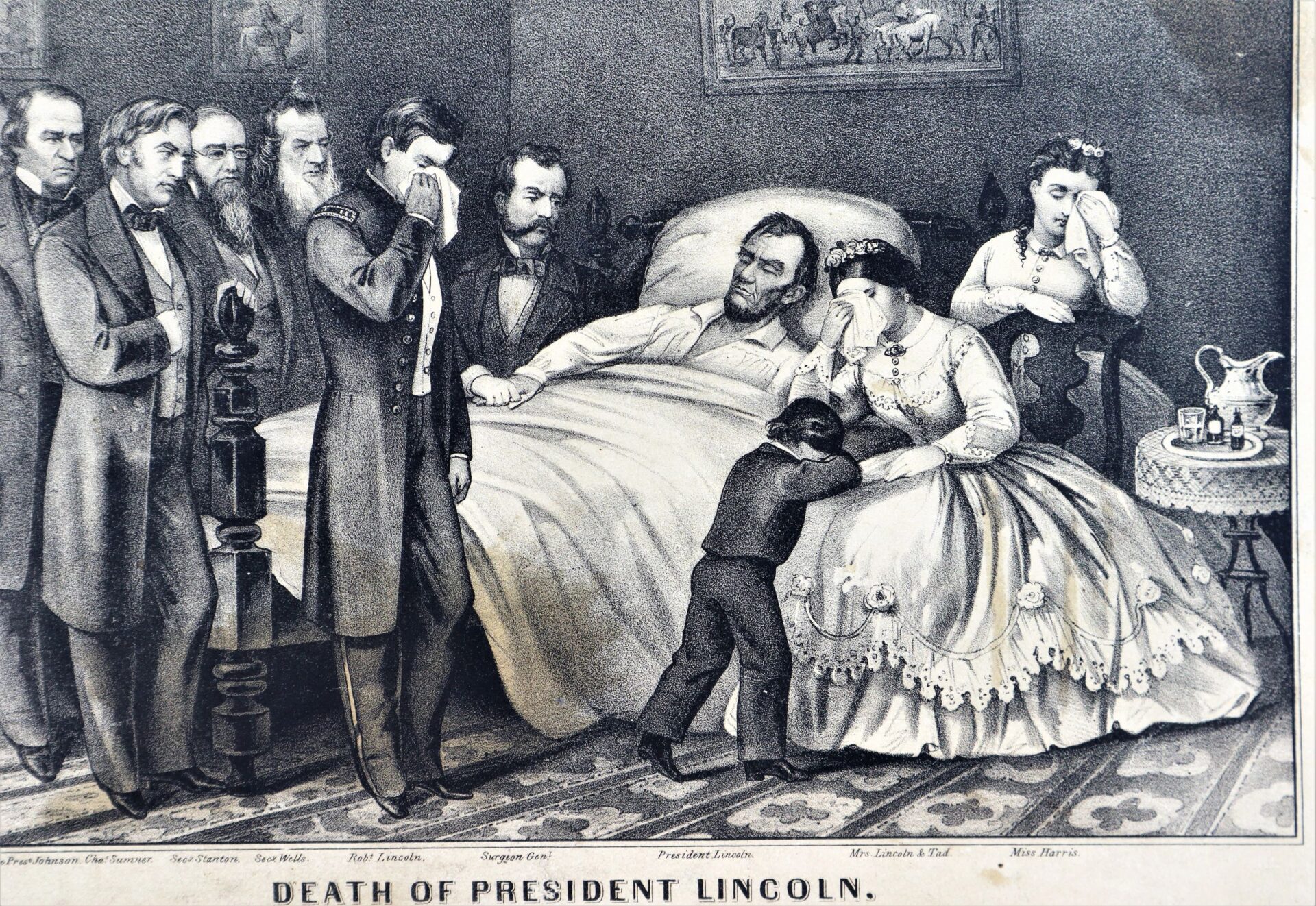 In "Death of President Lincoln, The Nation's Martyr," mourners gather at Lincoln’s bedside as he lies dead or dying. Some weep openly, and a child clings to a seated woman.