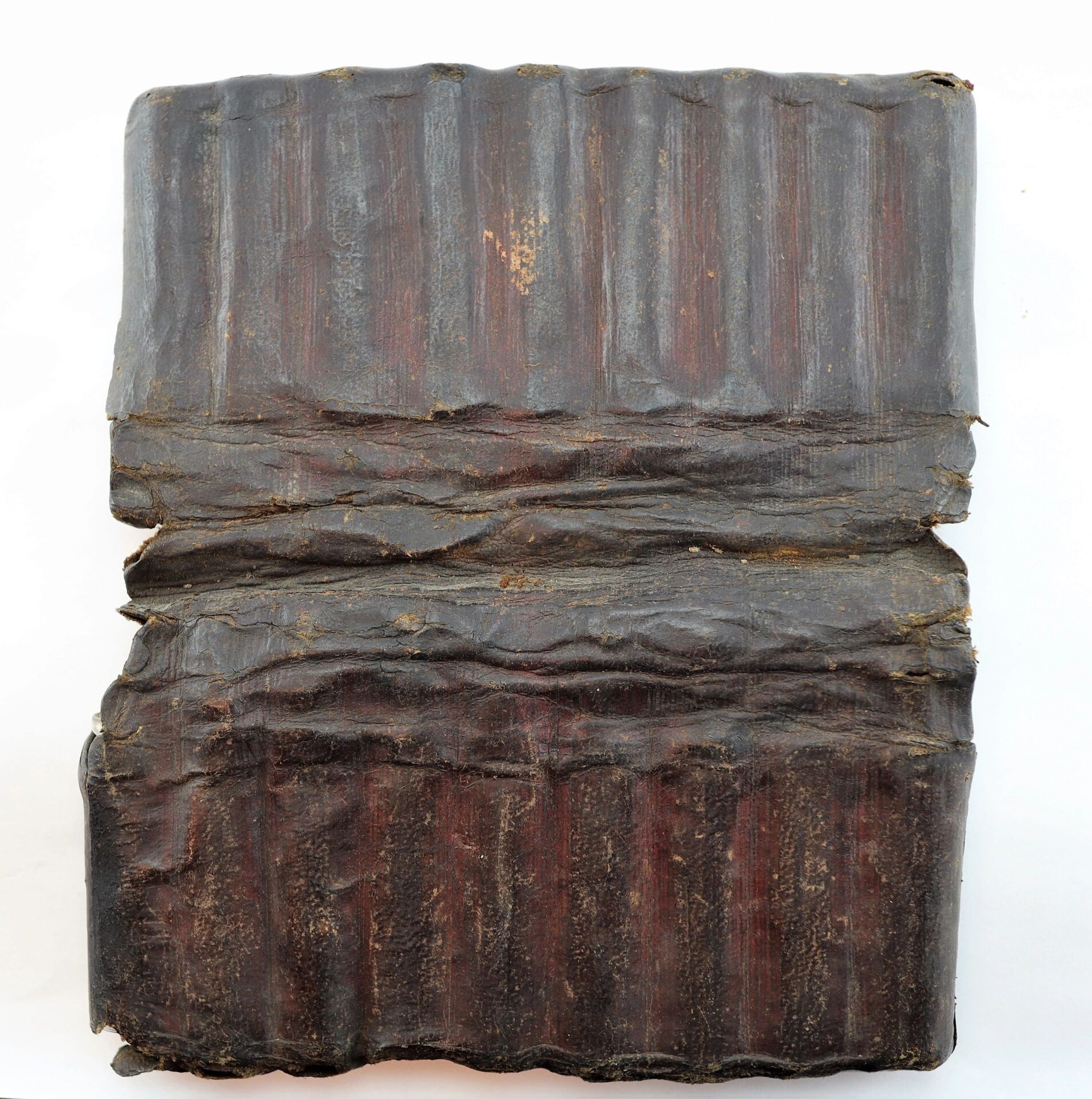 A large, rectangular Leather Apothecary Kit, sold, featuring a dark brown, textured surface with visible horizontal ridges and an uneven finish.