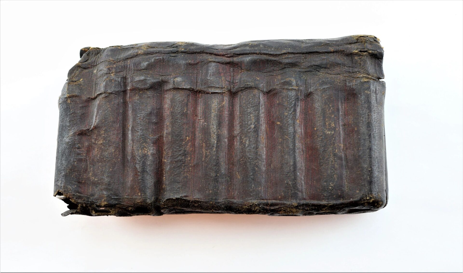 A rectangular, dark brown Leather Apothecary Kit with vertical ridges and a weathered appearance, photographed on a white background. Item is marked as sold.