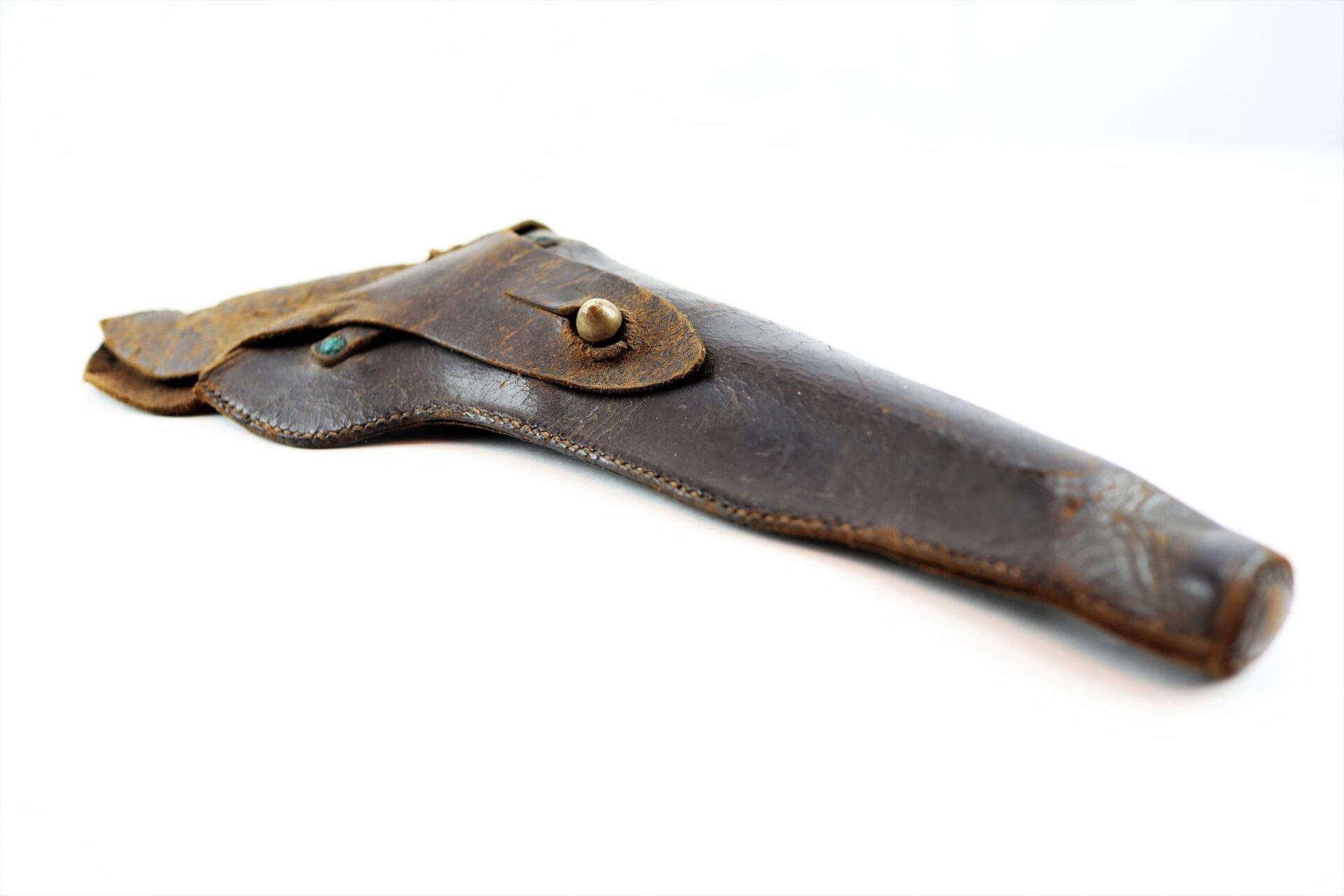 A Civil War Flap Holster in brown leather with a button closure, shown against a white background. / SOLD.