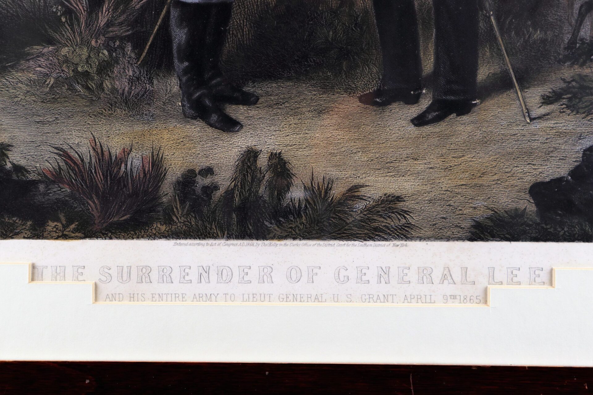 A close-up of the caption on "The Surrender of General Lee" shows “THE SURRENDER OF GENERAL LEE AND HIS ENTIRE ARMY TO LIEUT. GENERAL U. S. GRANT, APRIL 9TH 1865,” with several people’s lower legs visible above.