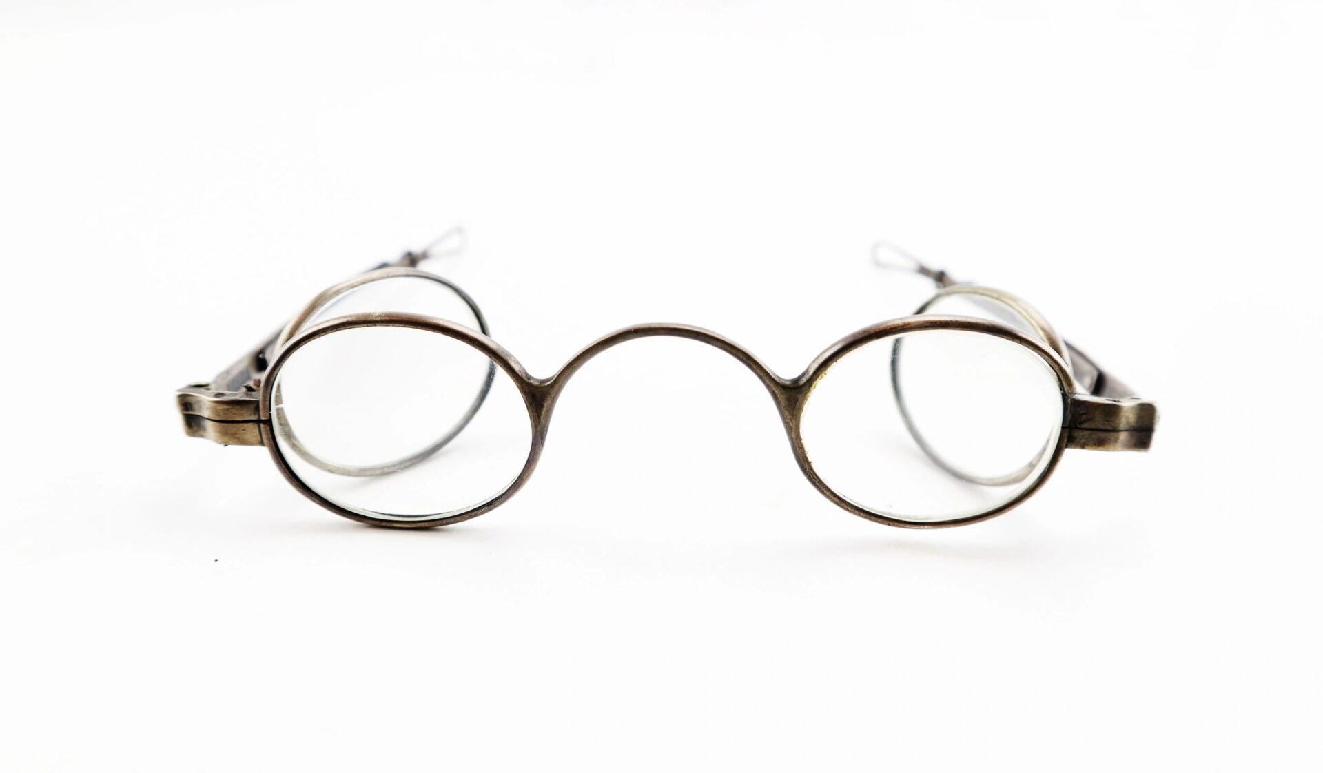 A pair of vintage Civil War Eyeglasses with round metal frames and clear lenses, photographed against a white background.
