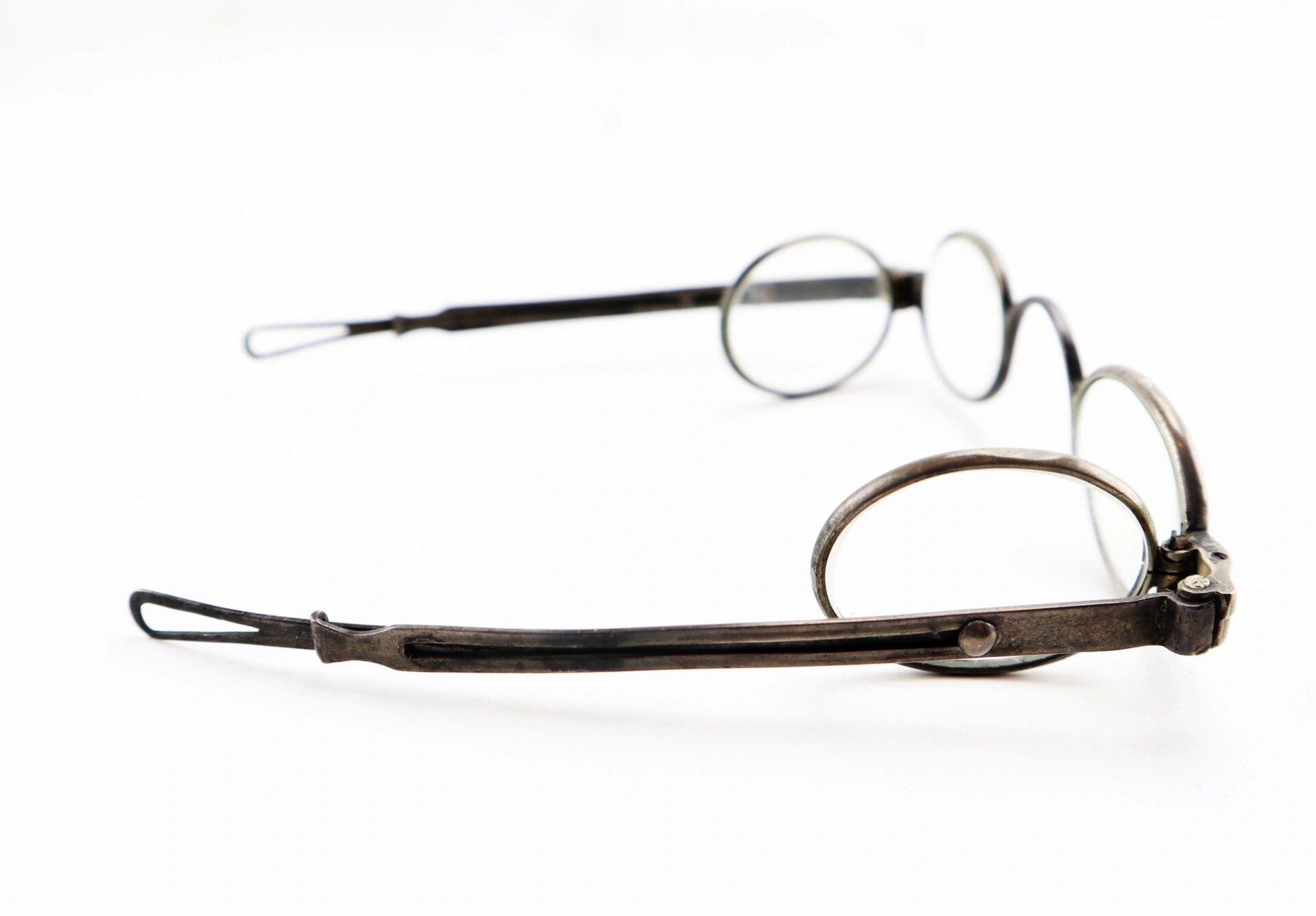 A pair of Civil War Eyeglasses with vintage round metal frames and side shields, displayed on a white background.