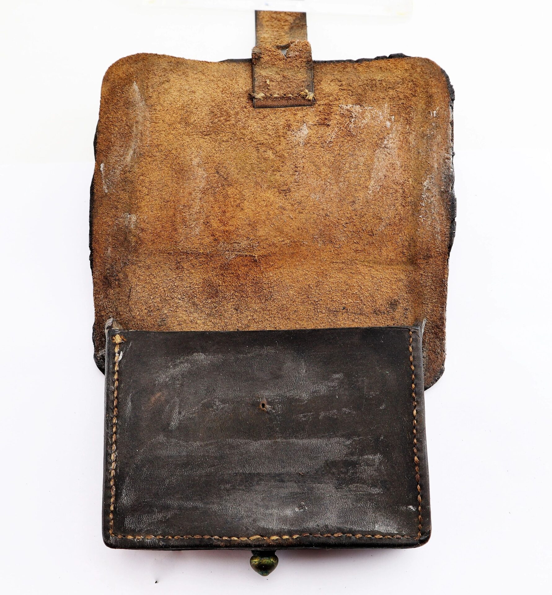 A worn Civil War Pistol Cartridge Box with a flap shows signs of age and use, photographed on a white background.