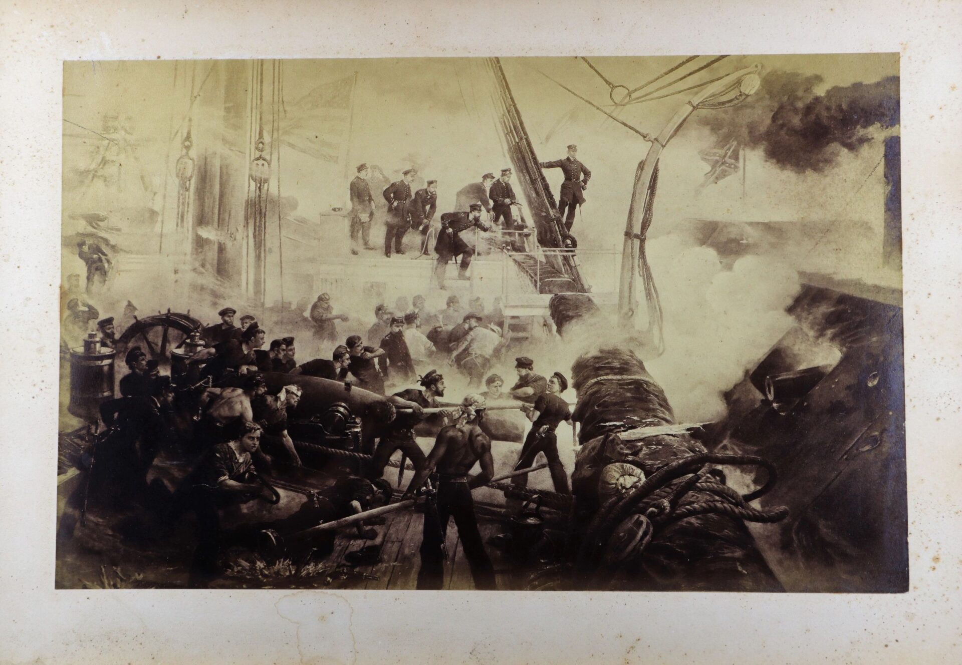 A group of men firing cannons during the Battle of Mobile Bay.