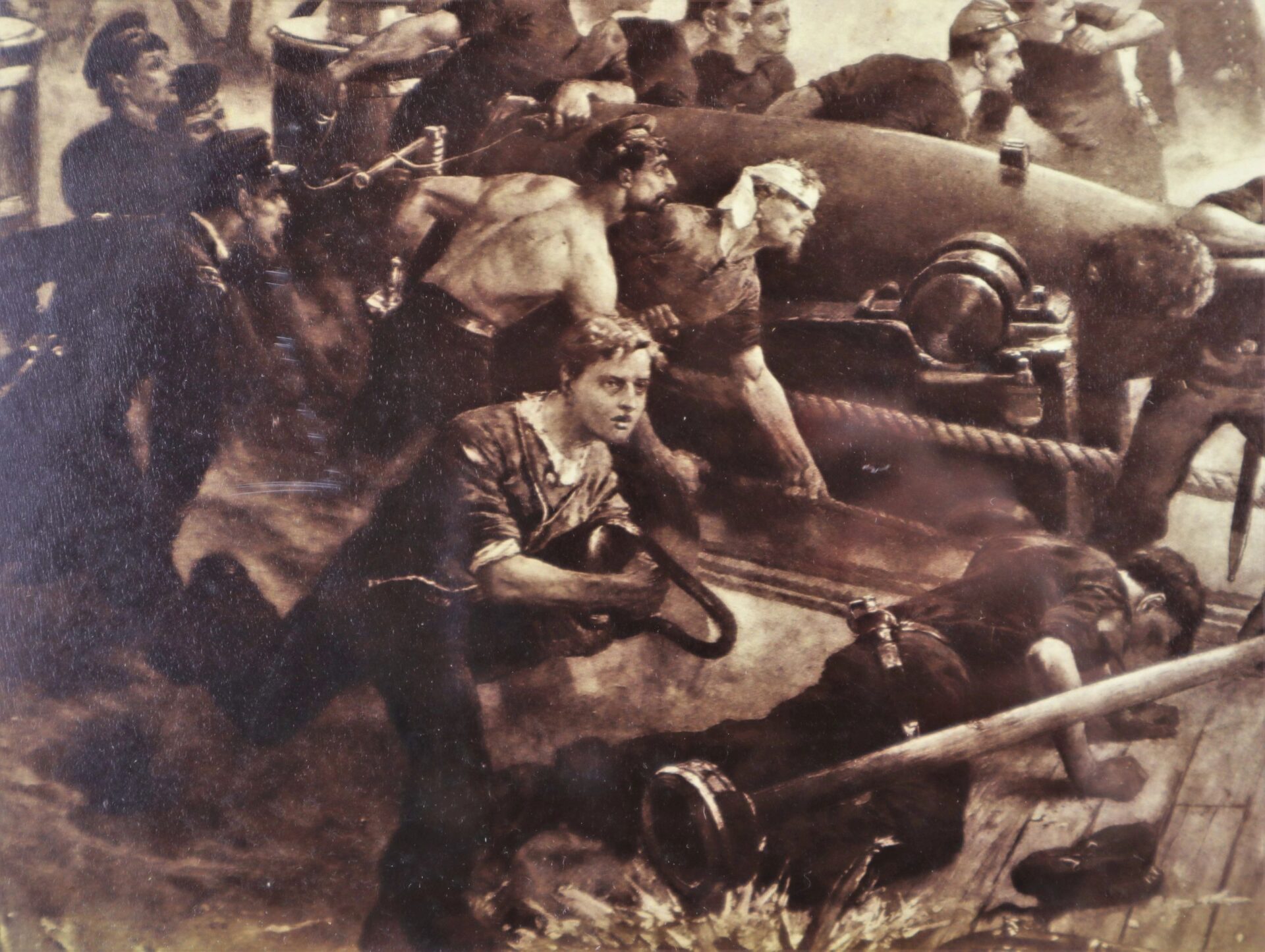 In "Battle of Mobile Bay," sailors—some shirtless—urgently load a large cannon on a ship’s deck amid battle, smoke swirling around them.