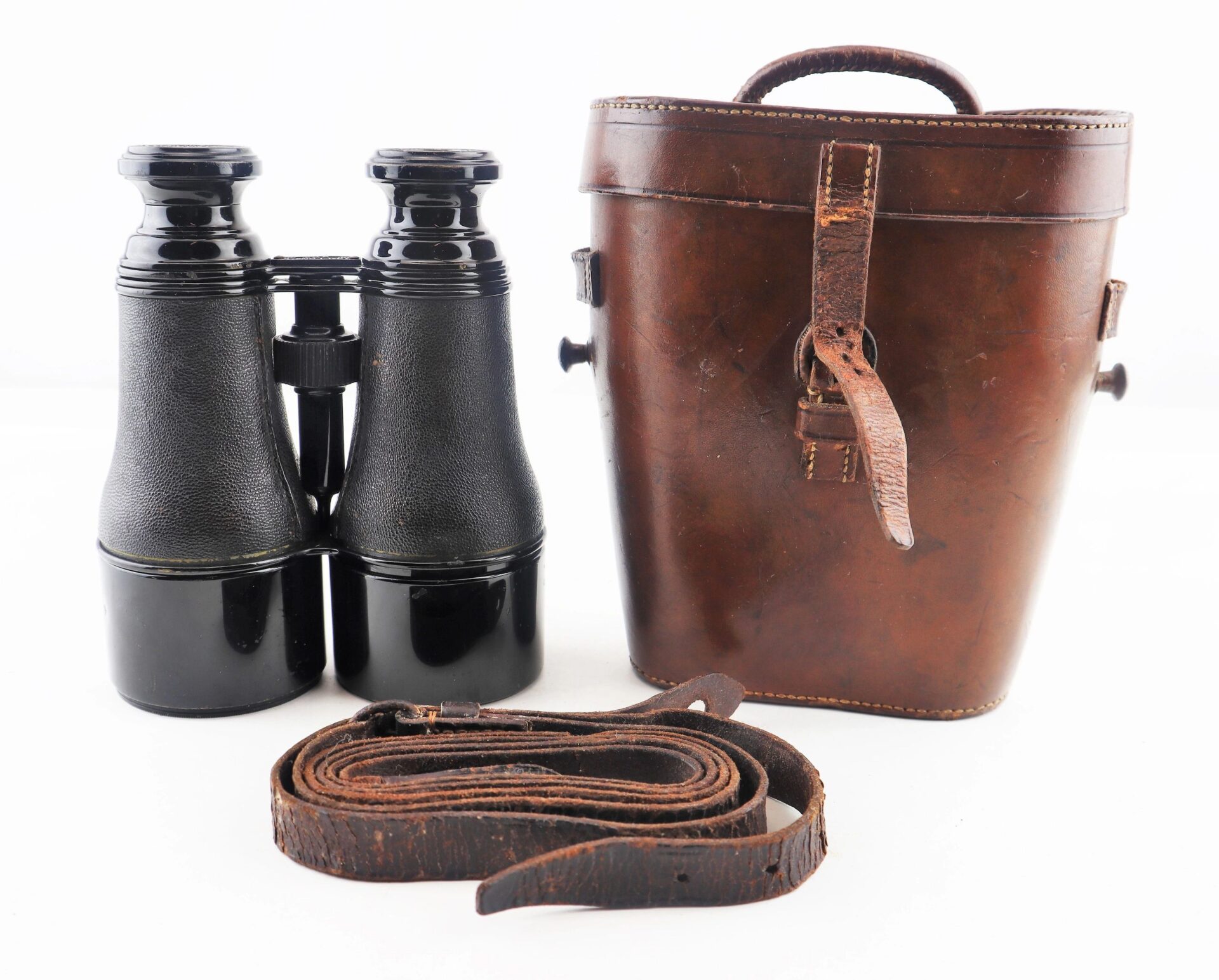 A pair of Civil War Field Glasses with a matching brown leather case and coiled strap is displayed on a white background.