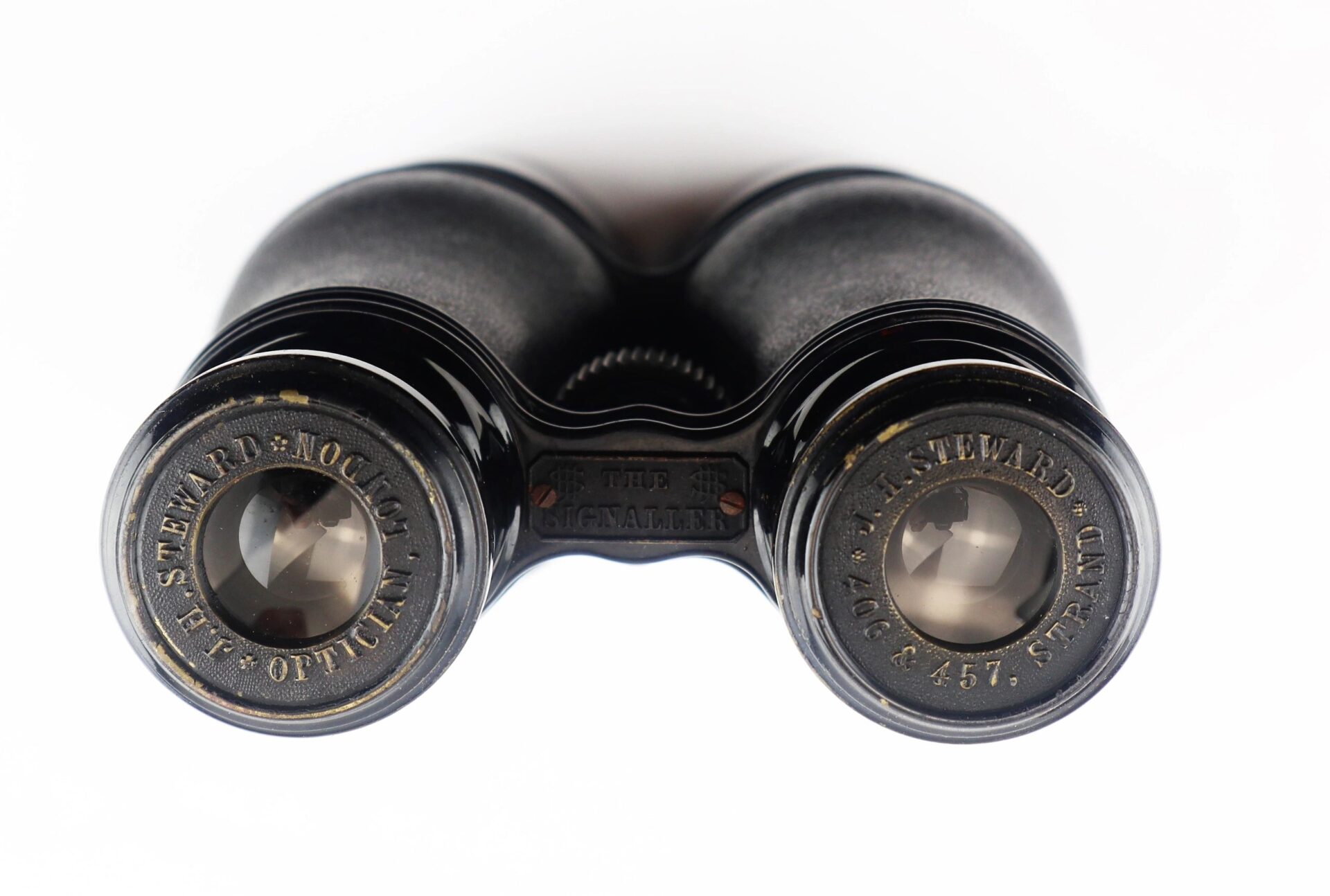 A close-up view of the lenses and markings on the Civil War Field Glasses and Case, highlighting the manufacturer's details.