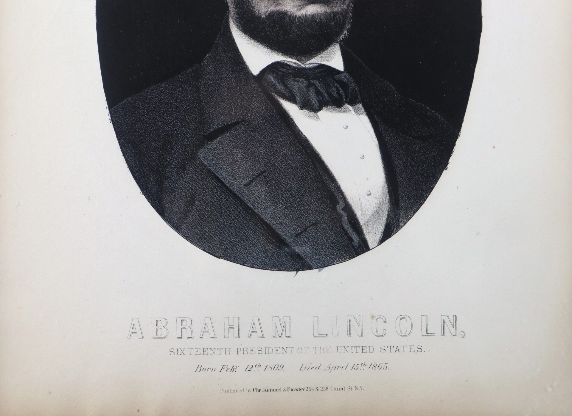 The Abraham Lincoln Lithograph features a partial portrait of a man in a suit and bow tie above the text "Abraham Lincoln, Sixteenth President of the United States," with his birth and death dates.