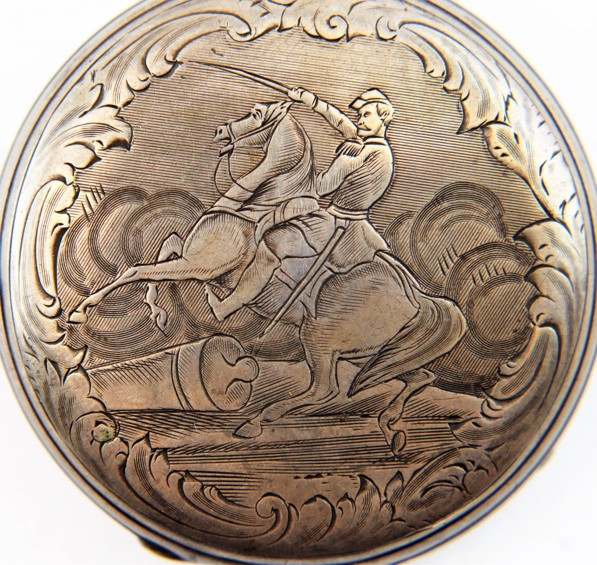 Silver Pocket Watch with Civil War Engraving featuring a soldier on horseback raising a sword, clouds, and a cannon in the background. / SOLD.