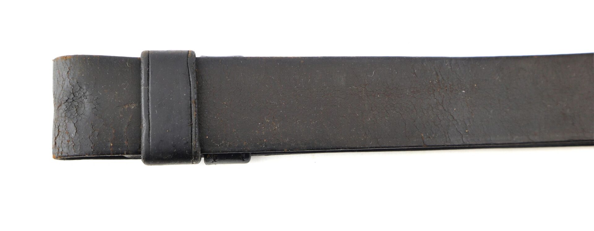 A close-up of a worn Civil War Musket Sling, featuring a keeper loop, shown against a white background.