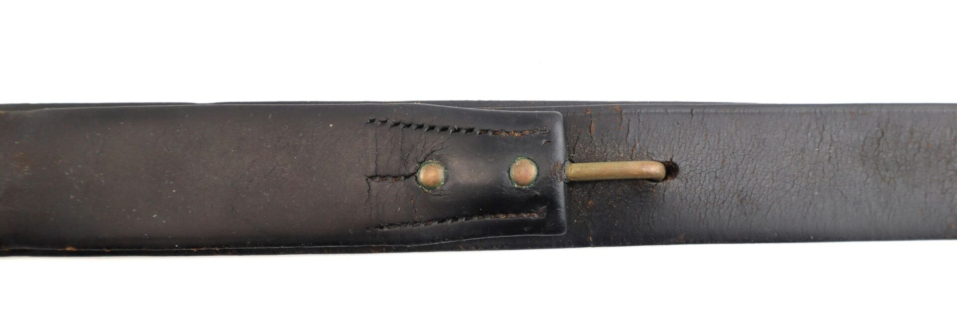 Close-up of a worn Civil War Musket Sling, showing visible stitching, rivets, and a metal pin partially inserted into a hole.
