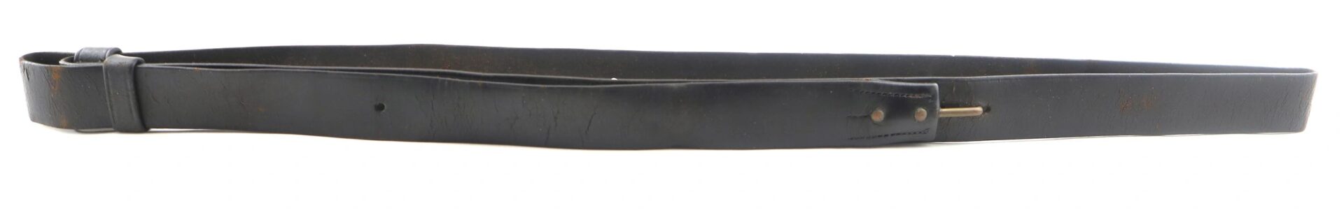 A Civil War musket sling with visible creases and a brass-colored buckle, laid flat against a white background.