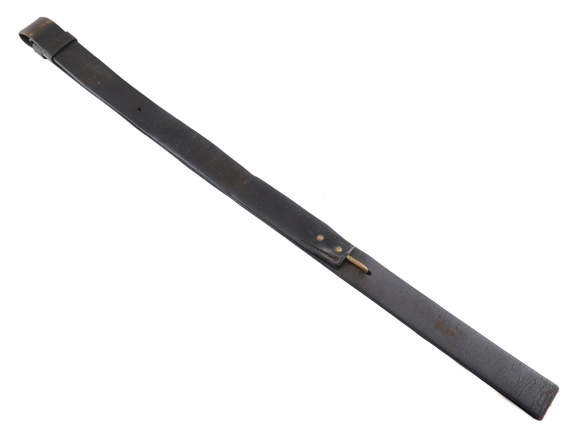 A Civil War Musket Sling, featuring a long dark leather strap with a metal buckle and rivets, is laid flat against a white background.