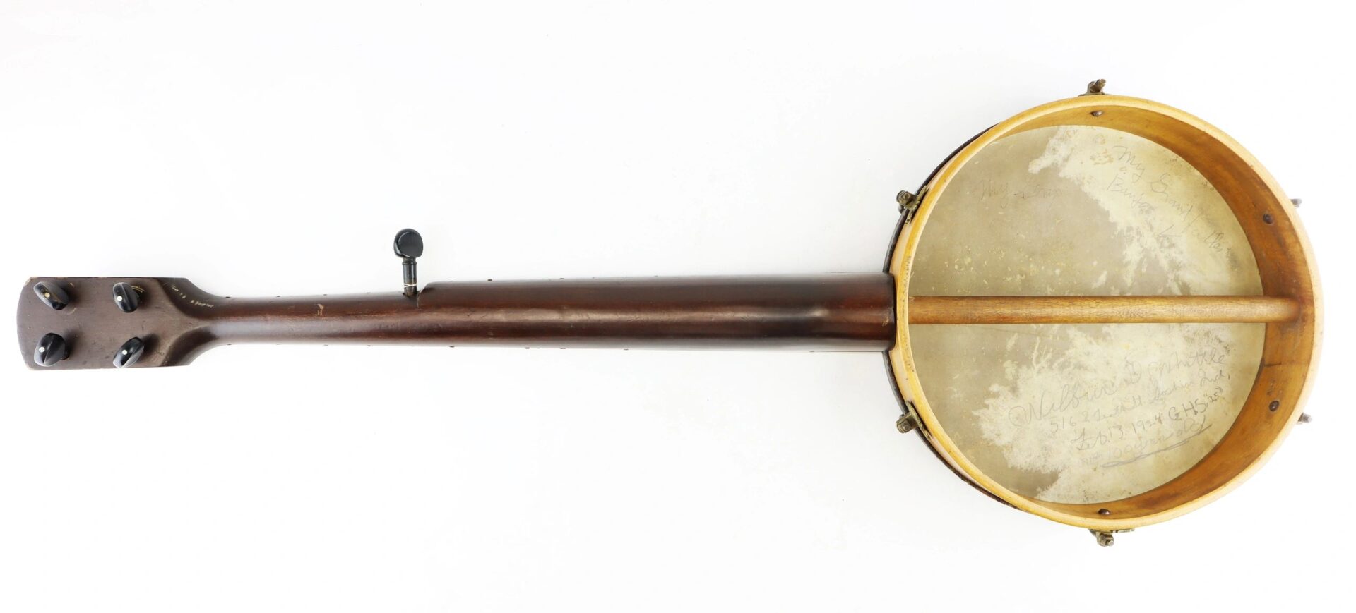 The Civil War Era Banjo (SOLD) is shown from the back, highlighting its wooden neck, tuners, and open-back drum with a visible dowel stick inside.