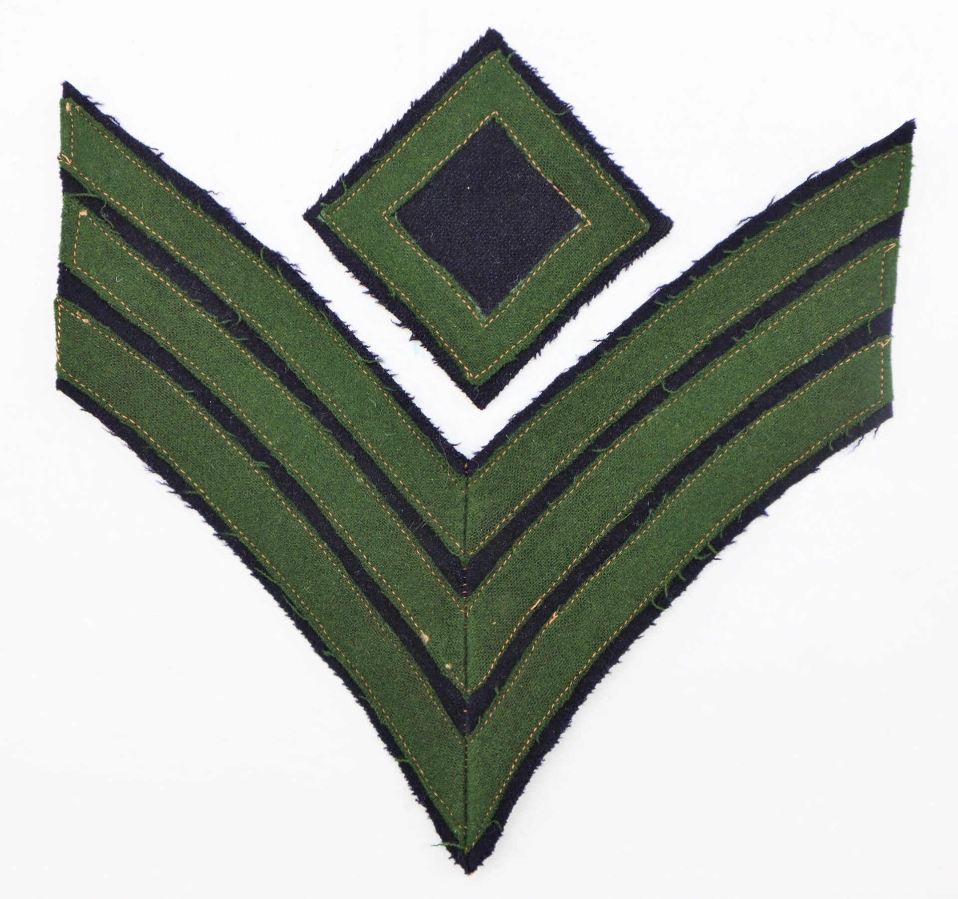 Civil War Rifleman/Sharpshooter Chevrons: green and black insignia with a diamond above two chevrons, displayed on a white background.