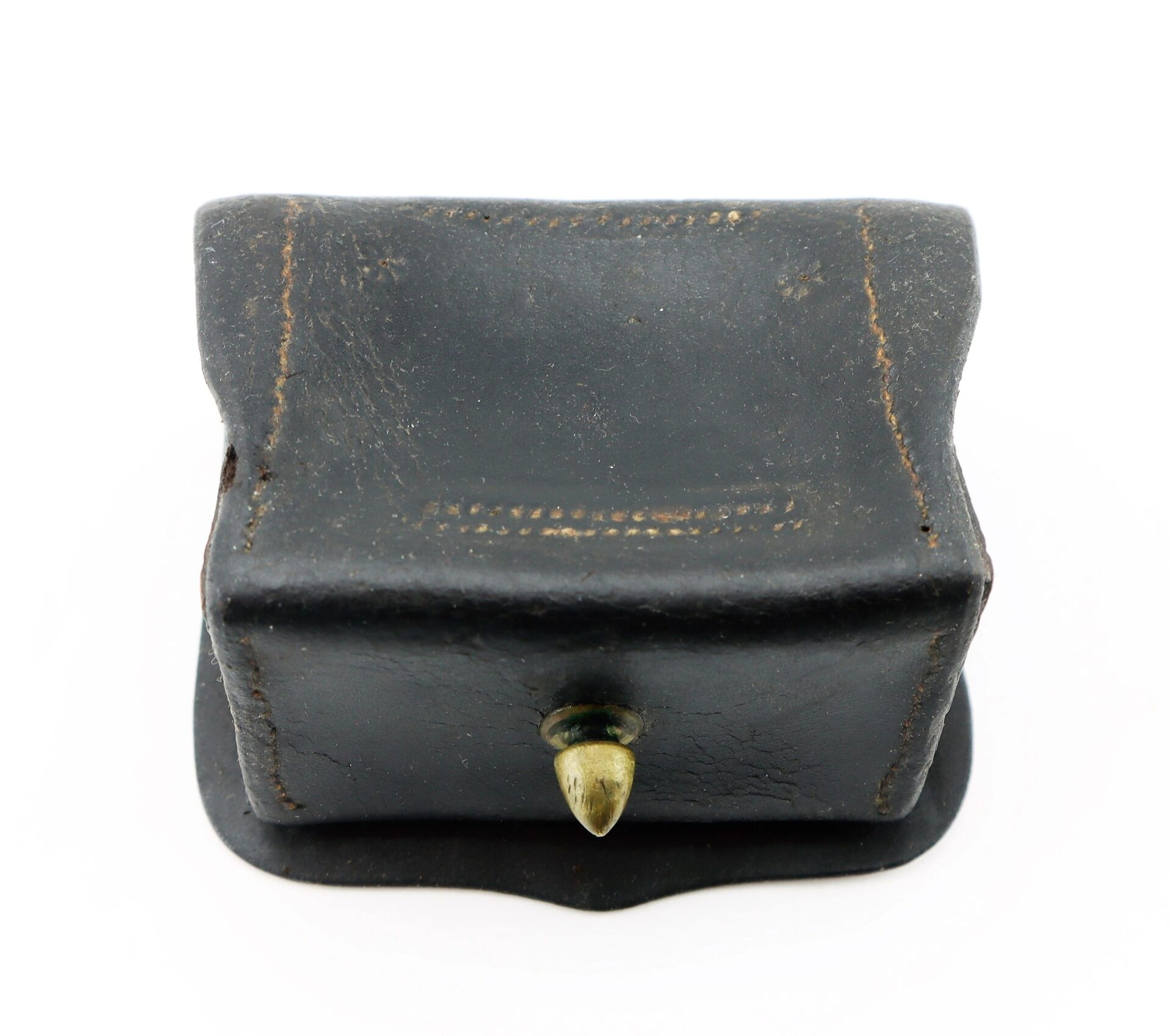 A Civil War Navy Fuse Box, small and rectangular with black leather, visible stitching, and a brass button closure, photographed against a white background.