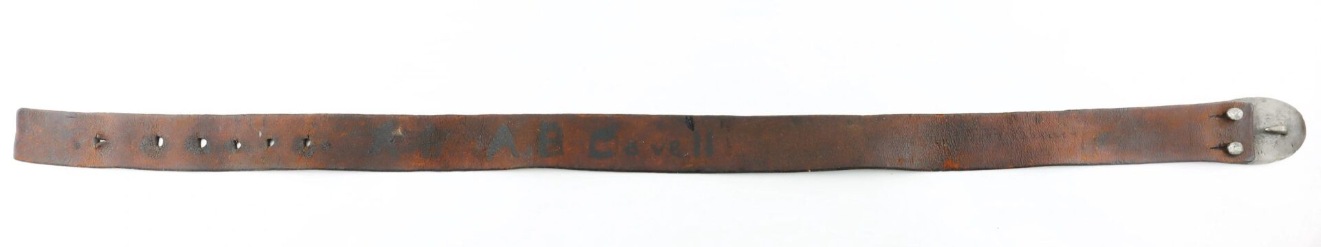 A U.S. Enlistedman’s Belt marked “A.B. Covell,” brown leather with multiple holes and a metal buckle, displayed flat on a white background. SOLD.