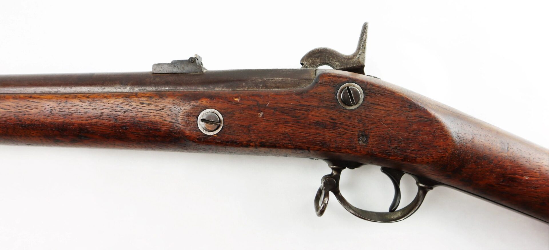 Side view of a Confederate "Captured and Collected" Model 1861 Springfield Rifle-Musket, featuring wooden and metal construction with visible hammer, trigger, and iron sights.