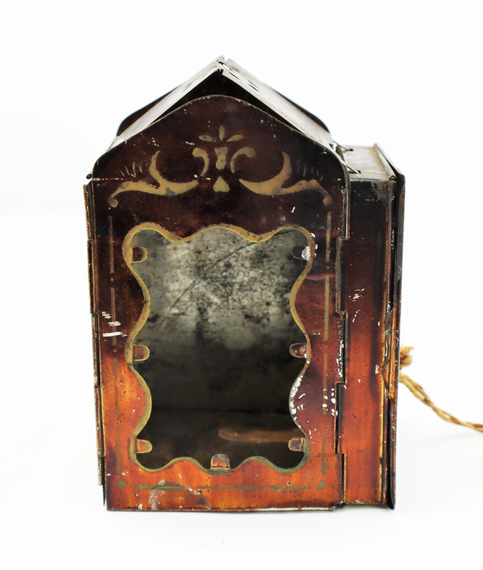 The Civil War Era Minor’s Patent Lantern features an open front, decorative edges, rope handle, and visible signs of age and wear.