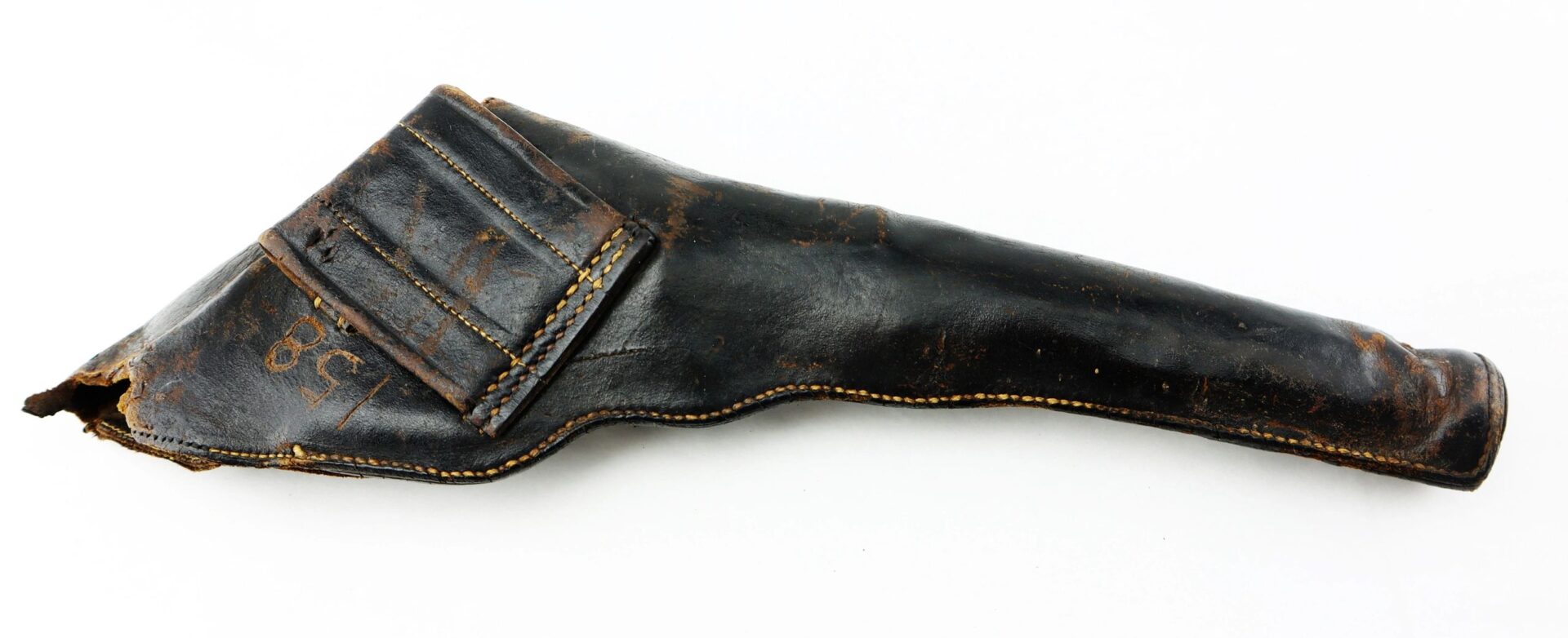 A worn Civil War Era Revolver Holster made of black leather, featuring visible stitching and areas of scuffing and damage.